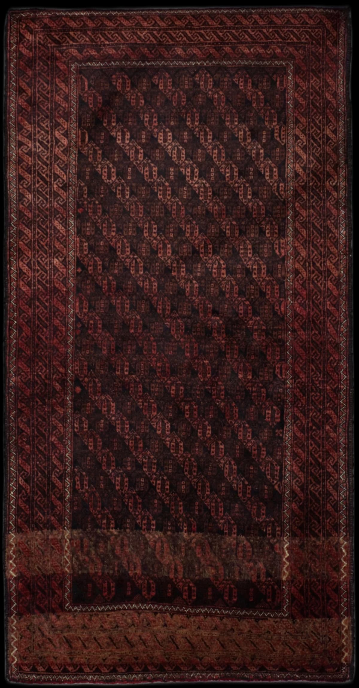 Persian rug in dimensions 186 centimeters length by 97 centimeters width with mainly red and brown colors