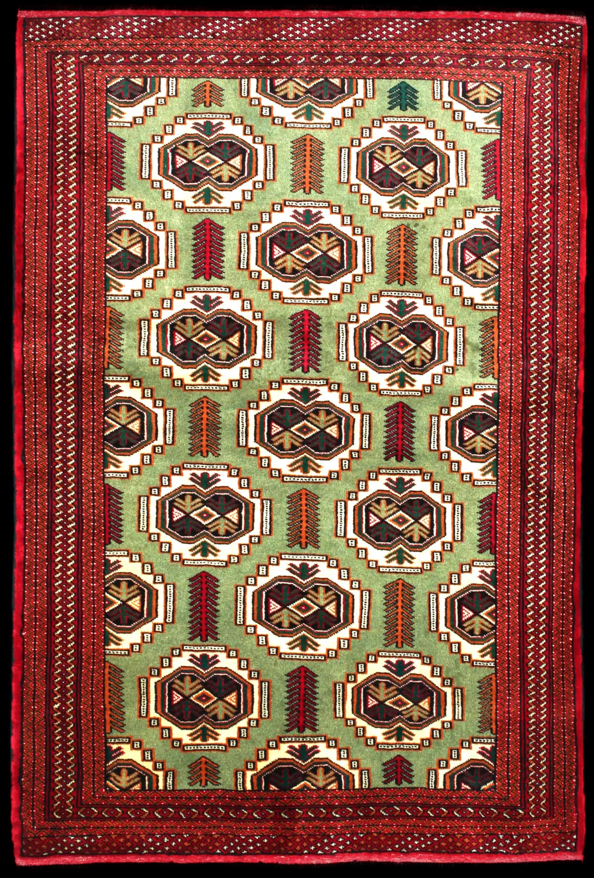Persian rug of Turkoman style in dimensions 193 centimeters length by 130 centimeters width with mainly red and green colors
