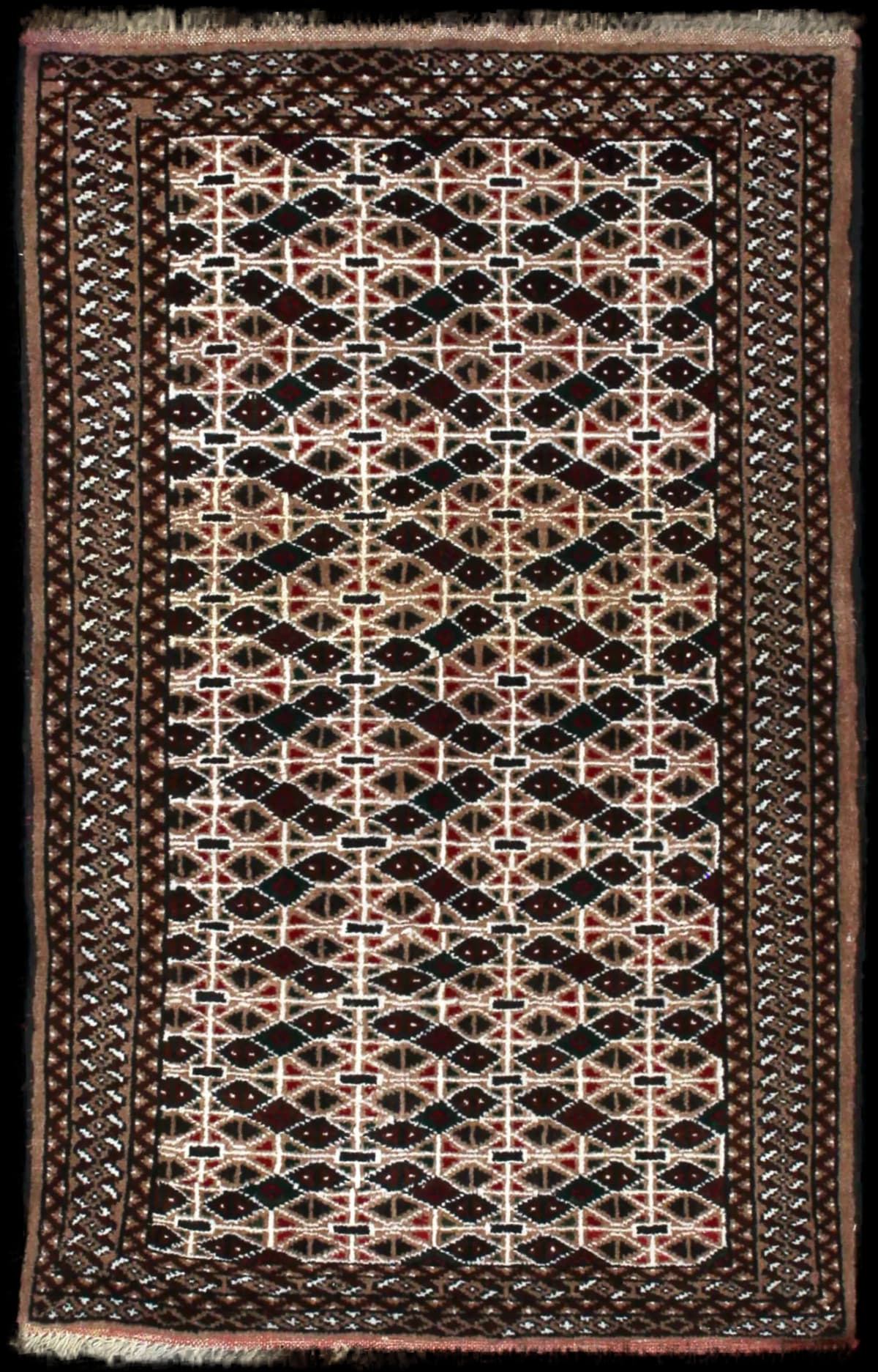 Persian rug of Turkoman style in dimensions 117 centimeters length by 76 centimeters width with mainly brown colors
