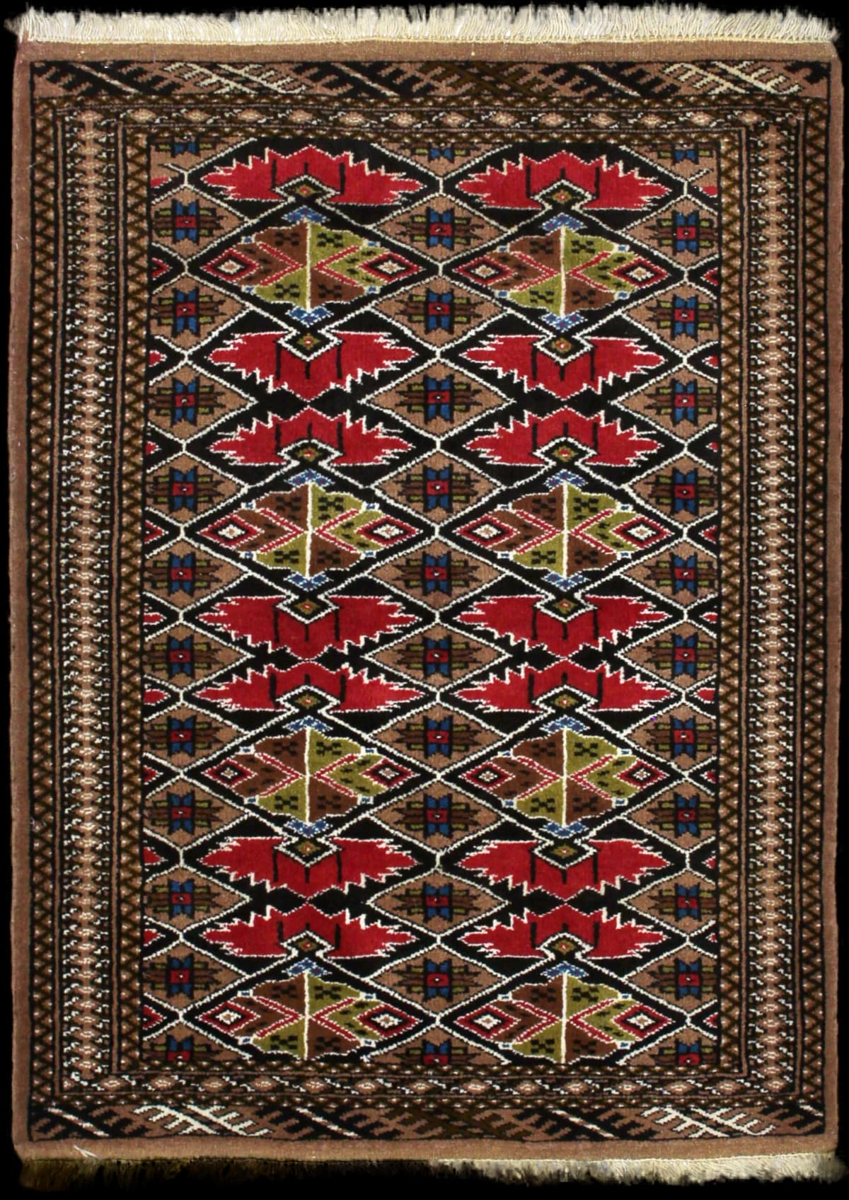 Persian rug of Turkoman style in dimensions 140 centimeters length by 103 centimeters width with mainly brown colors