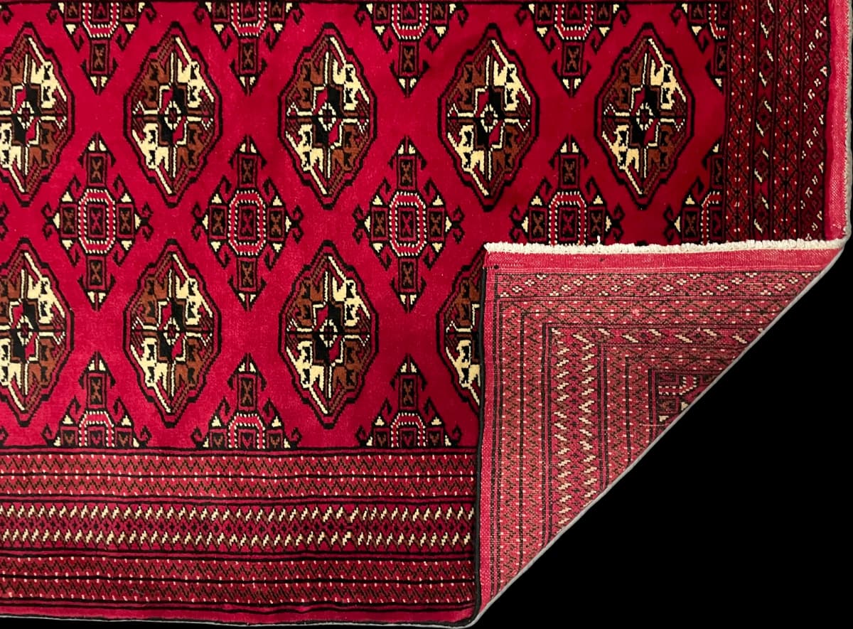 Perserteppich Turkmene, orientalisch, 103x150 cm, überwiegend in Rot — Gefaltet
