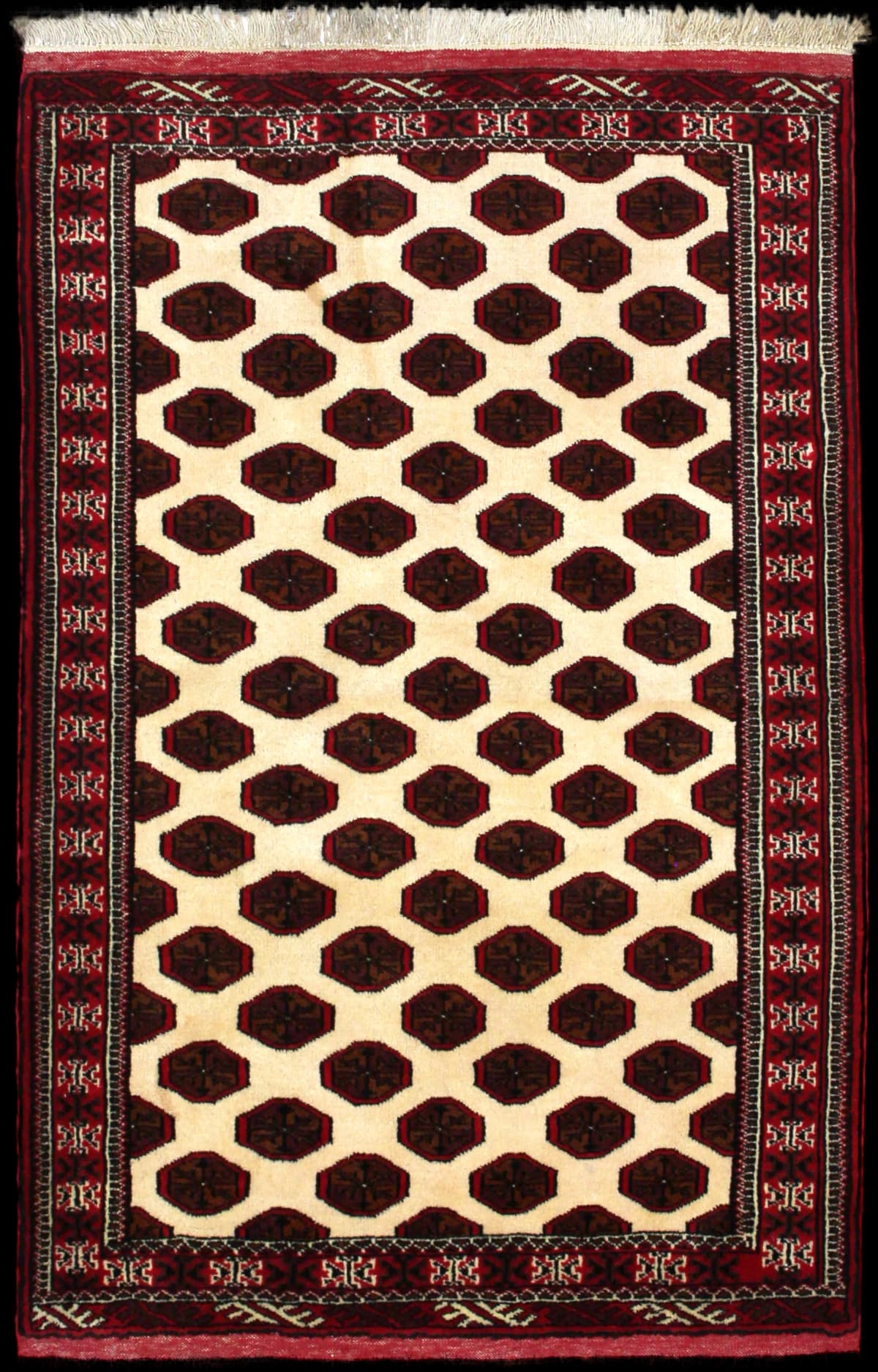 Persian rug of Turkoman style in dimensions 165 centimeters length by 105 centimeters width with mainly beige and brown colors