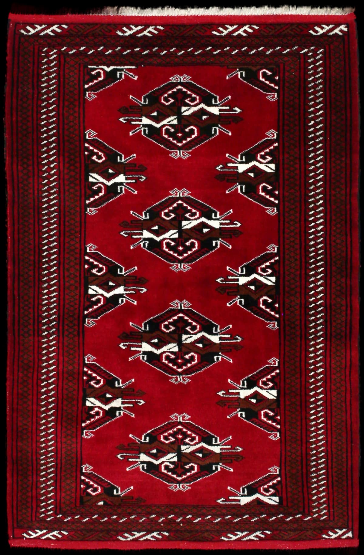Persian rug of Turkoman style in dimensions 150 centimeters length by 98 centimeters width with mainly red colors