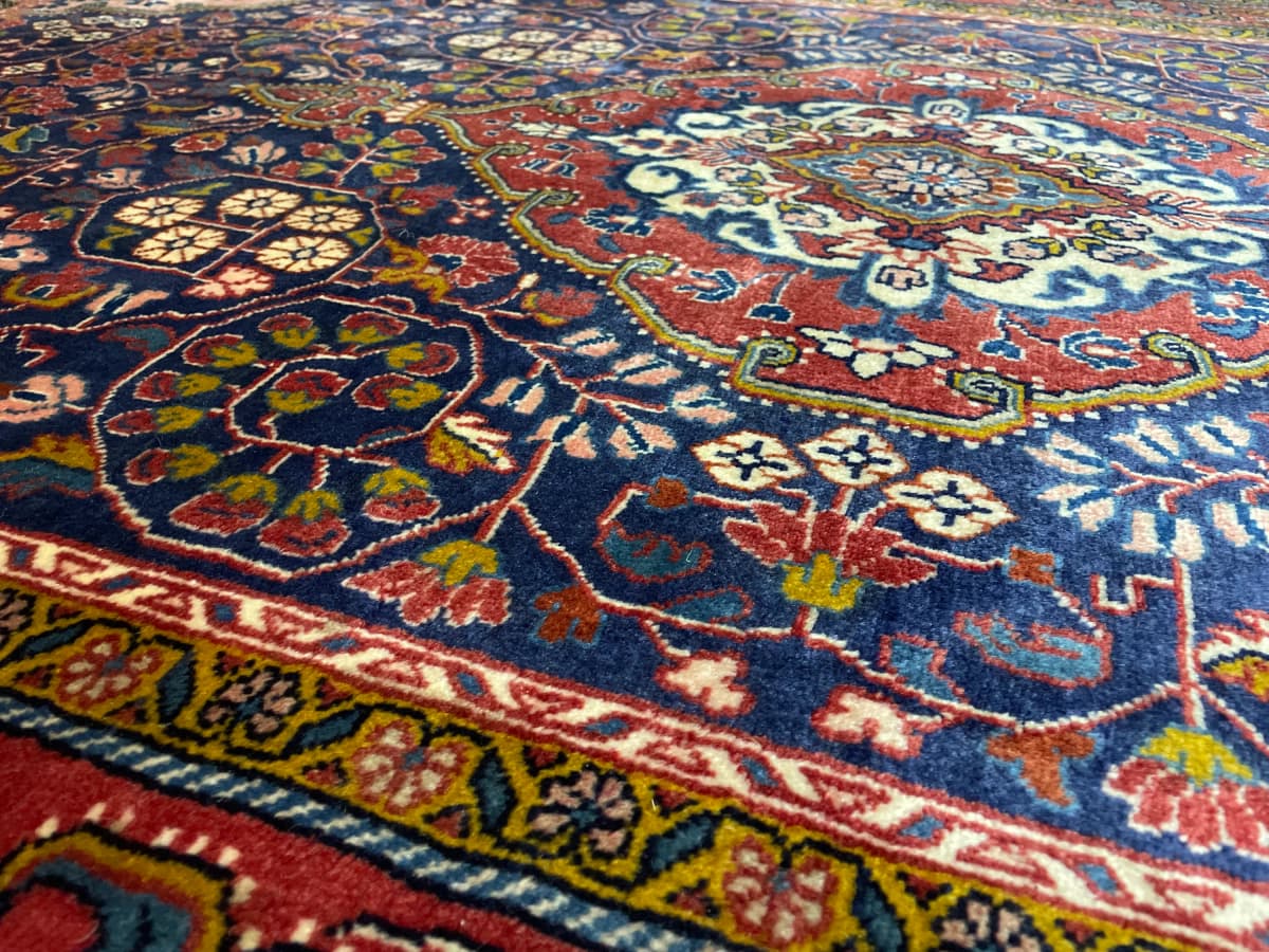 Tapis persan Malayer, oriental, 131x209 cm, principalement rouge et bleu — Gros plan de la texture