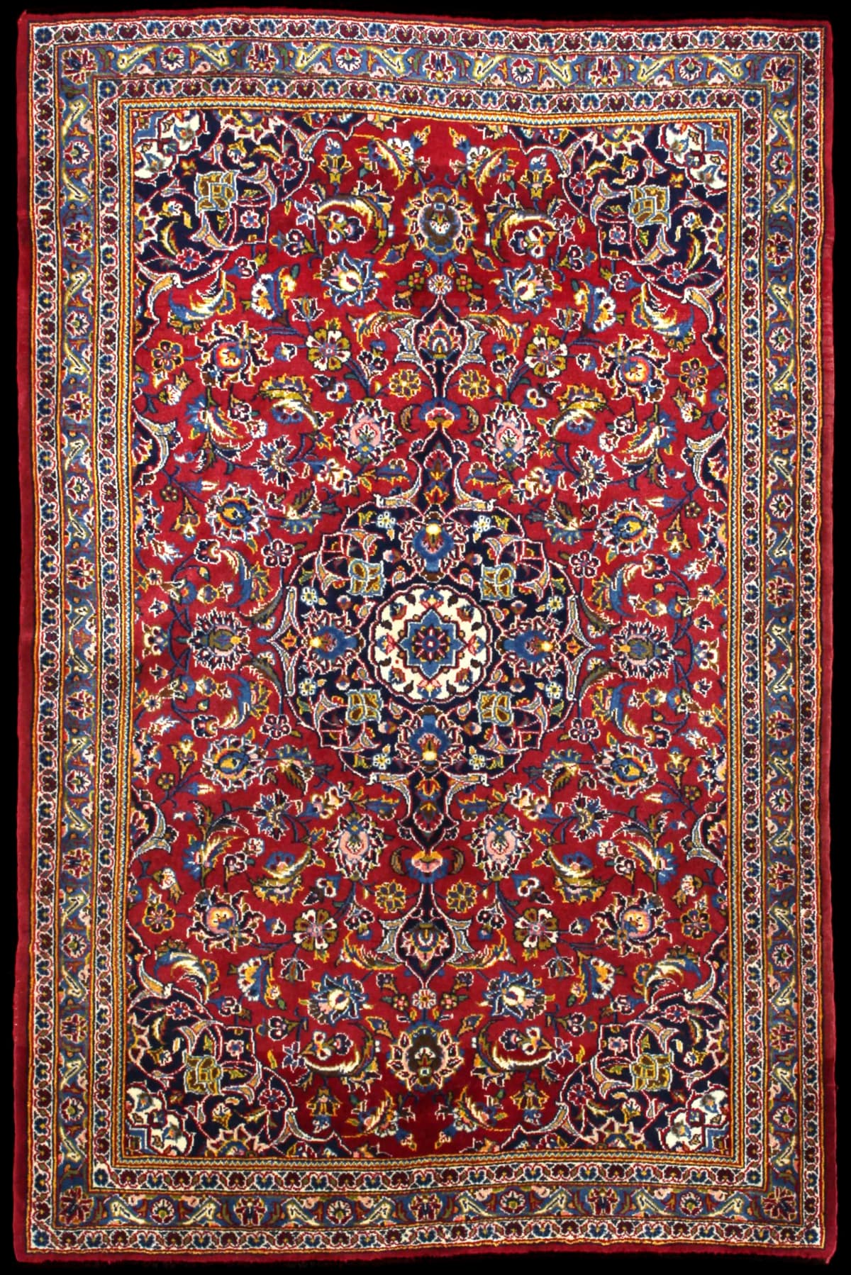 Persian rug of Kashan style in dimensions 184 centimeters length by 120 centimeters width with mainly red and blue colors
