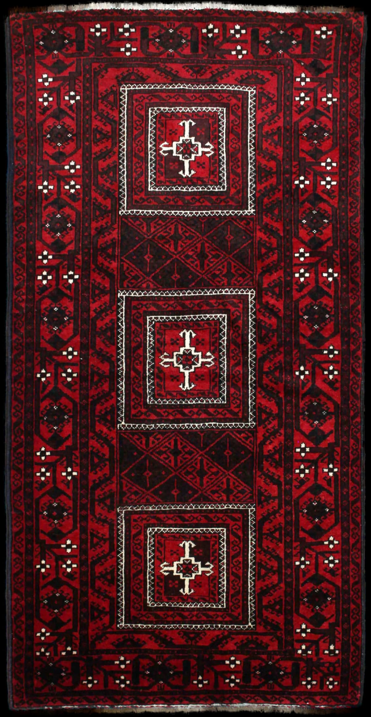 Persian rug of Baluch style in dimensions 208 centimeters length by 107 centimeters width with mainly red colors