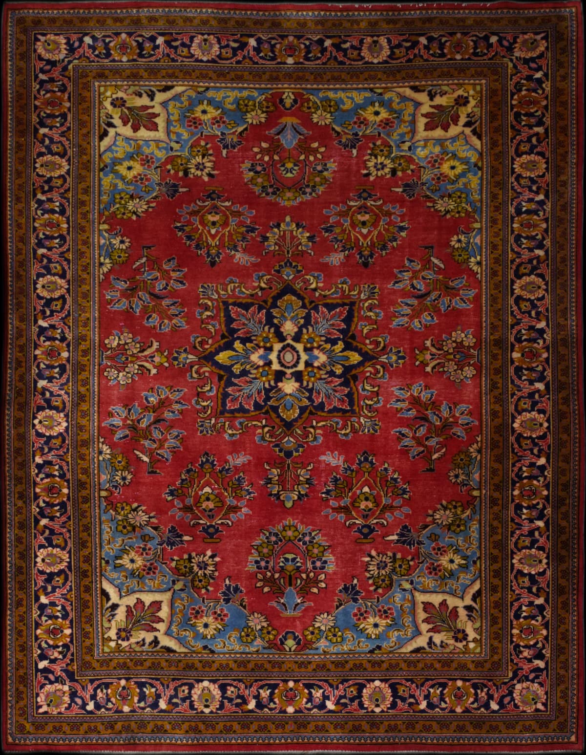 Persian rug in dimensions 245 centimeters length by 205 centimeters width with mainly red colors