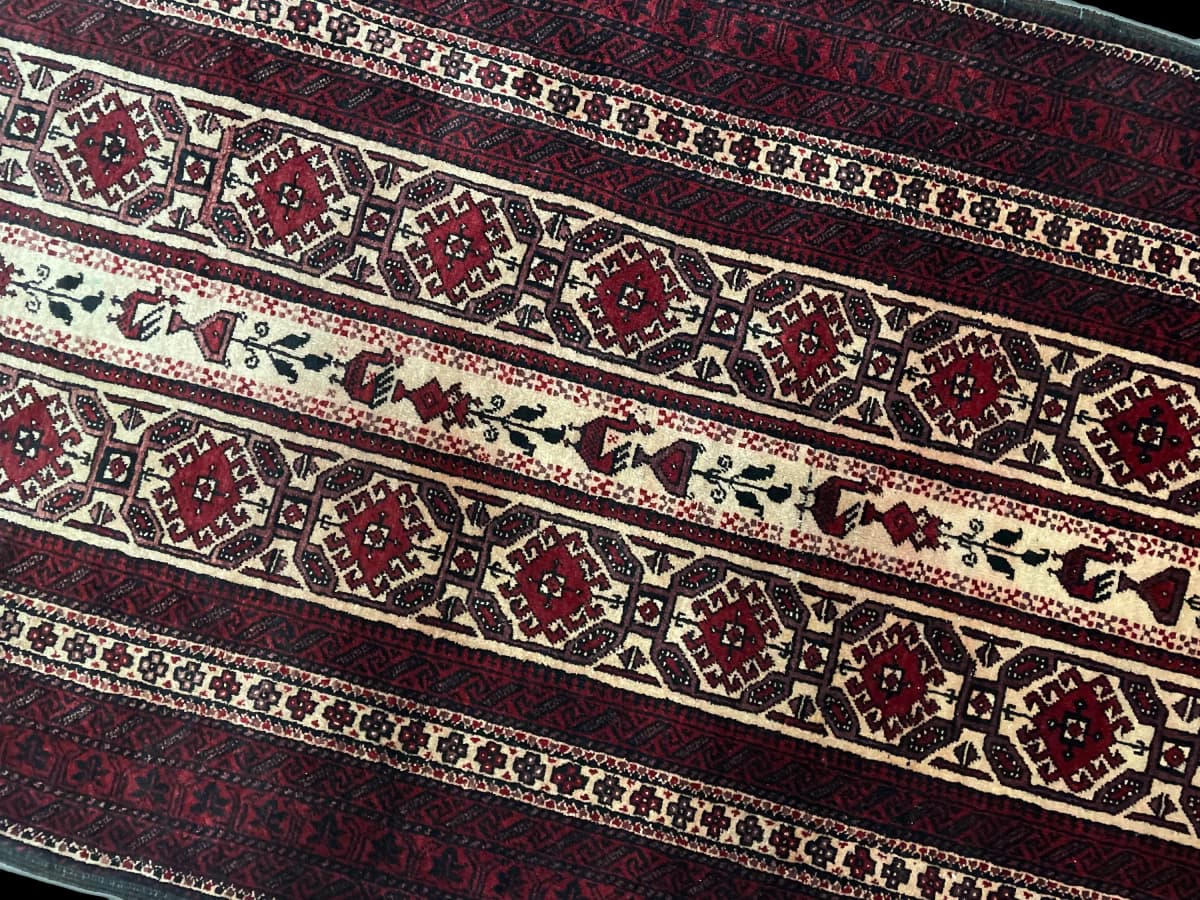 Perserteppich Belutsch, orientalisch, 108x205 cm, überwiegend in Rot — Perspektive