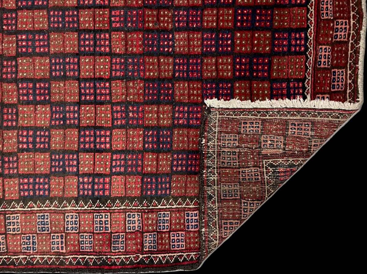 Perserteppich Belutsch, orientalisch, 93x170 cm, überwiegend in Braun und Blau — Gefaltet