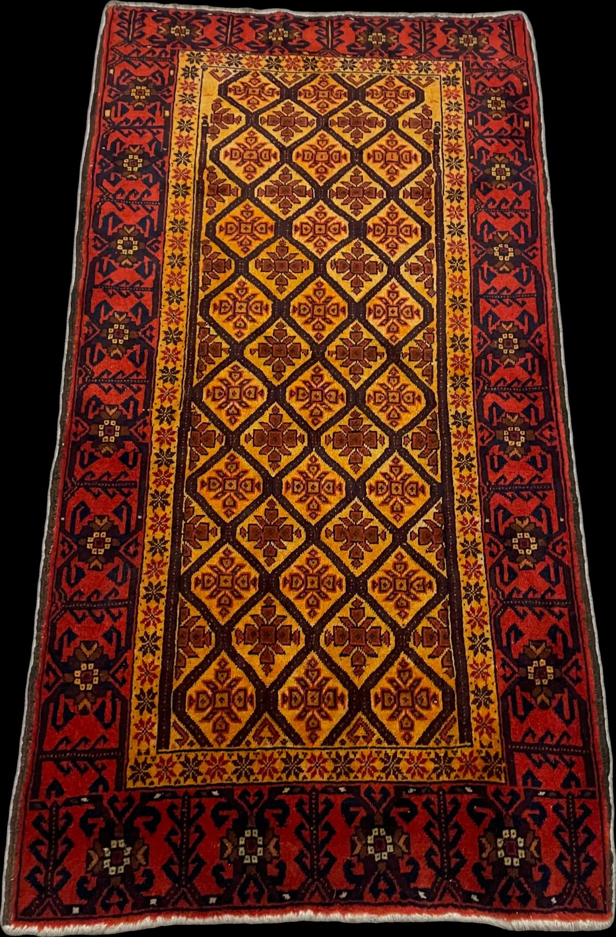 Perserteppich Belutsch, geometrisch, 91x176 cm, überwiegend in Orange und Gelb — Perspektive