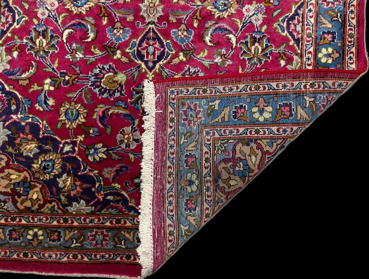Perserteppich Kashmar, orientalisch, 110x217 cm, überwiegend in Rot — Gefaltet