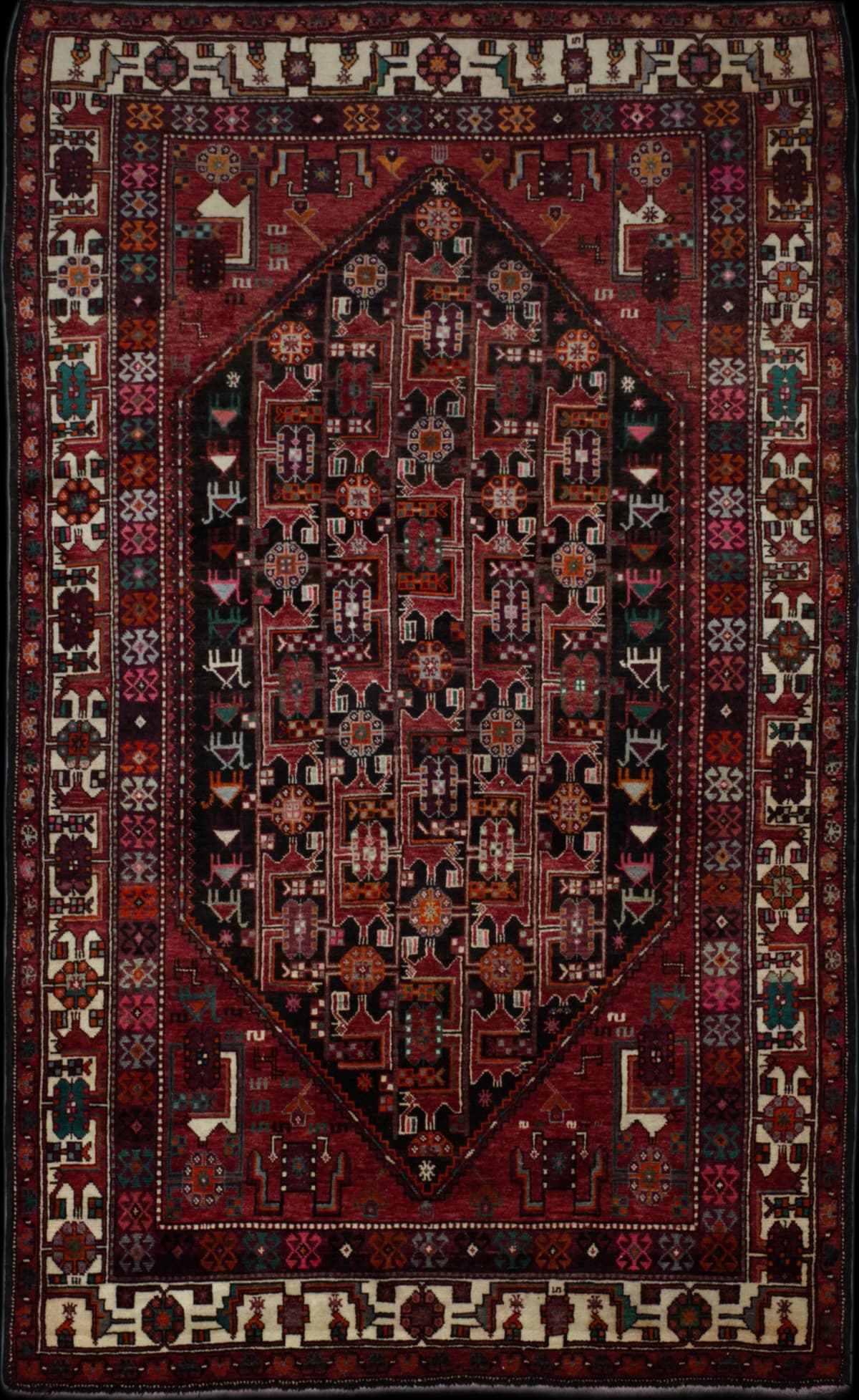 Persian rug in dimensions 300 centimeters length by 170 centimeters width with mainly red colors