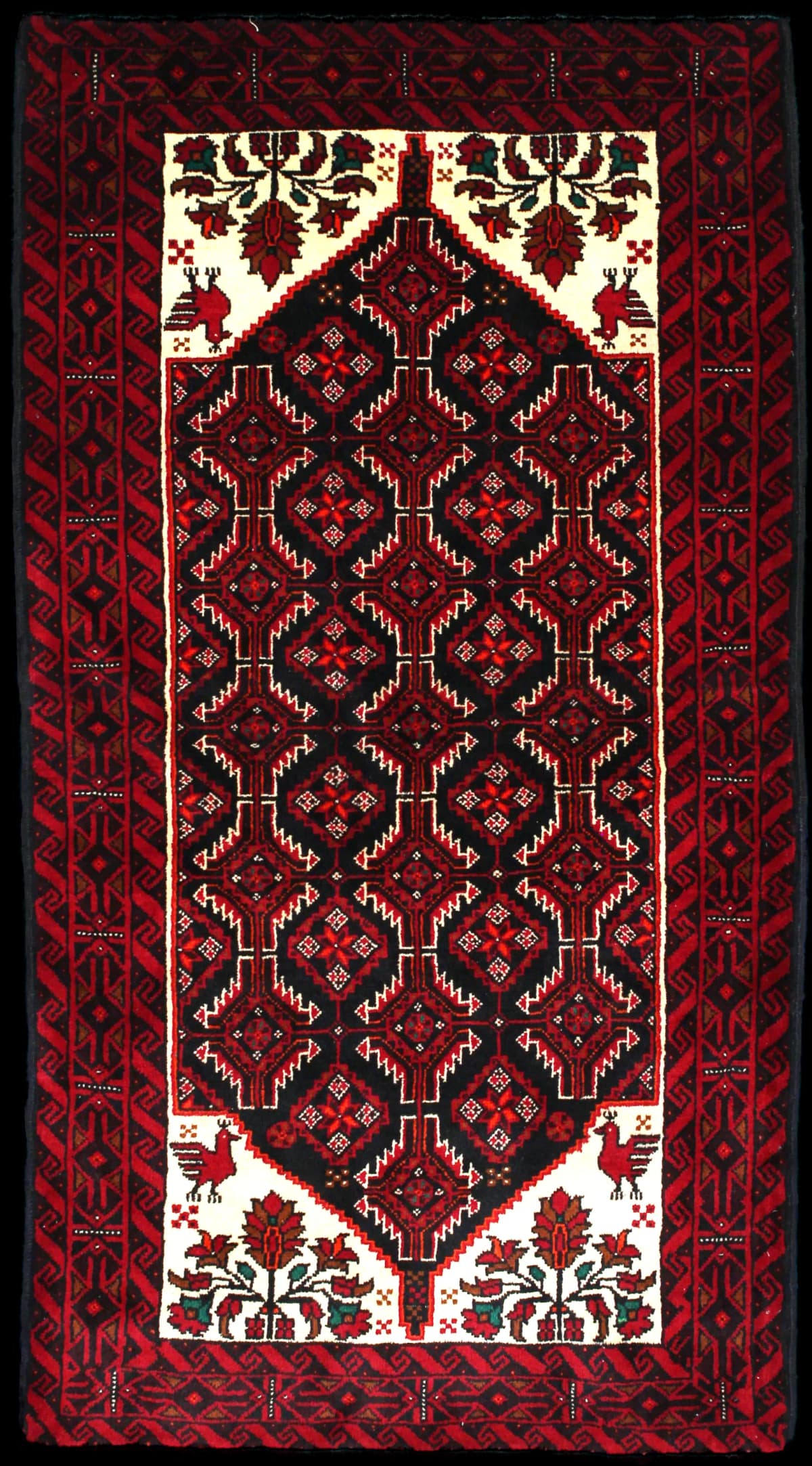 Persian rug of Baluch style in dimensions 194 centimeters length by 105 centimeters width with mainly red colors — Full view