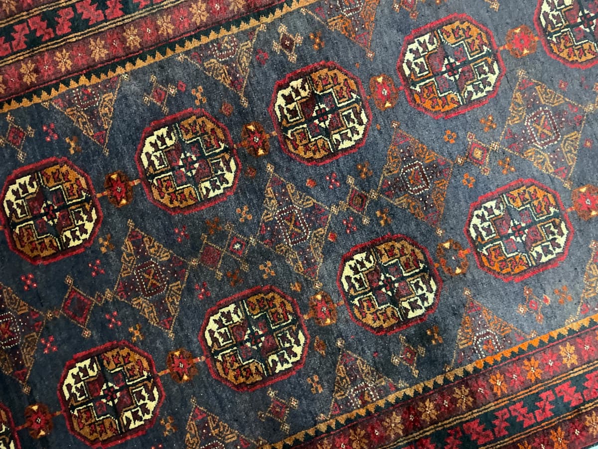 Perserteppich Belutsch, orientalisch, 116x188 cm, überwiegend in Rot — Perspektive