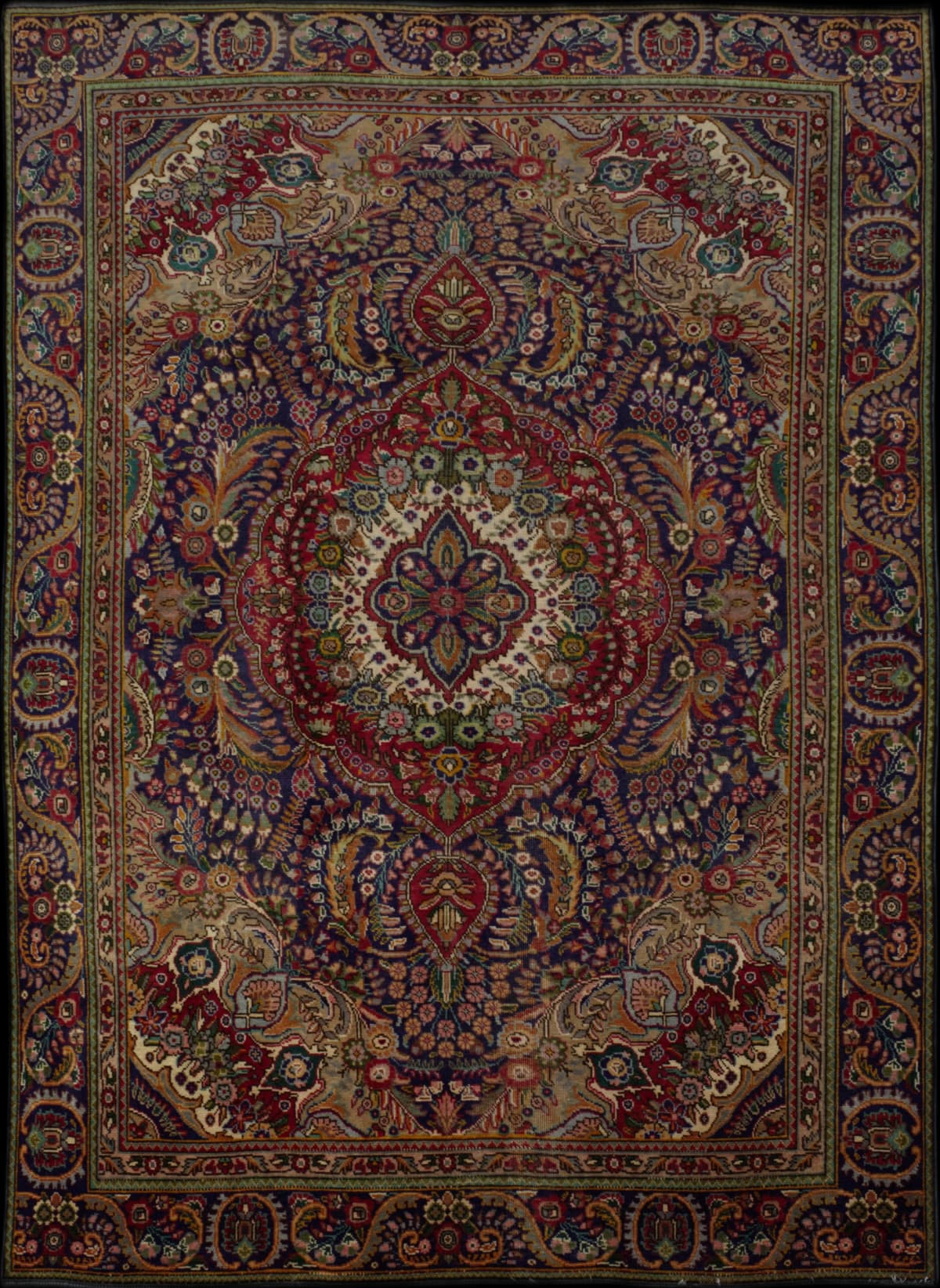 Persian rug in dimensions 286 centimeters length by 190 centimeters width with mainly red and blue colors