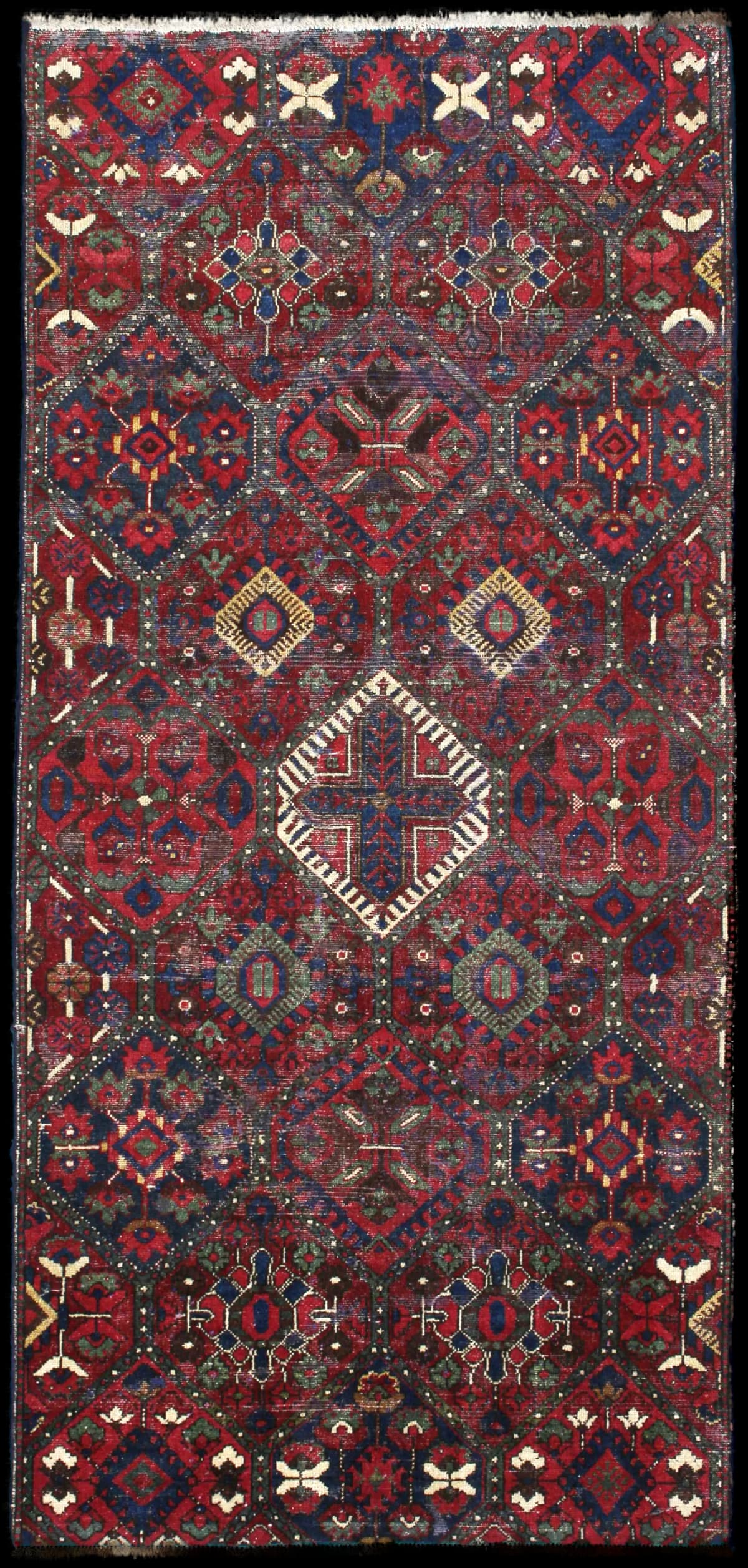 Persian rug of Bakhtiari style in dimensions 220 centimeters length by 105 centimeters width with mainly red and blue colors