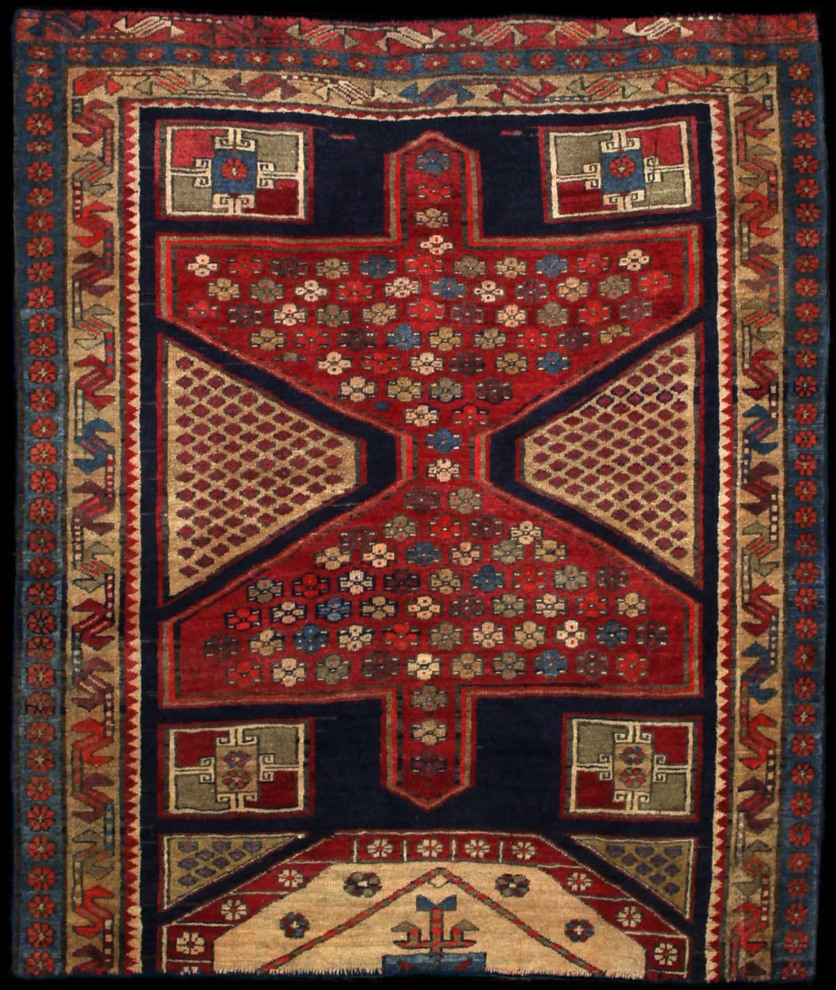 Persian rug of Meshginshahr style in dimensions 134 centimeters length by 116 centimeters width with mainly blue and red colors