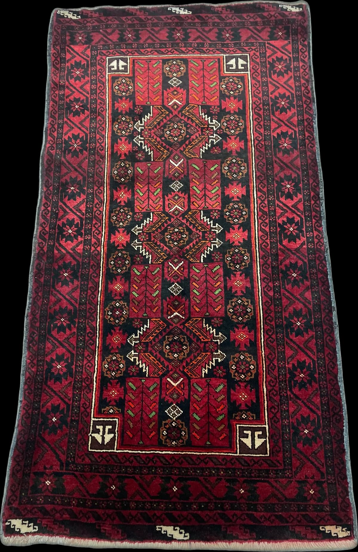 Perserteppich Belutsch, orientalisch, 110x212 cm, überwiegend in Rot — Perspektive