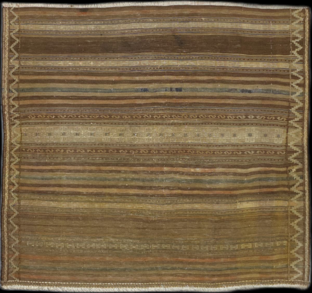 Persian rug of Sumak Kilim style in dimensions 145 centimeters length by 136 centimeters width with mainly brown and beige colors