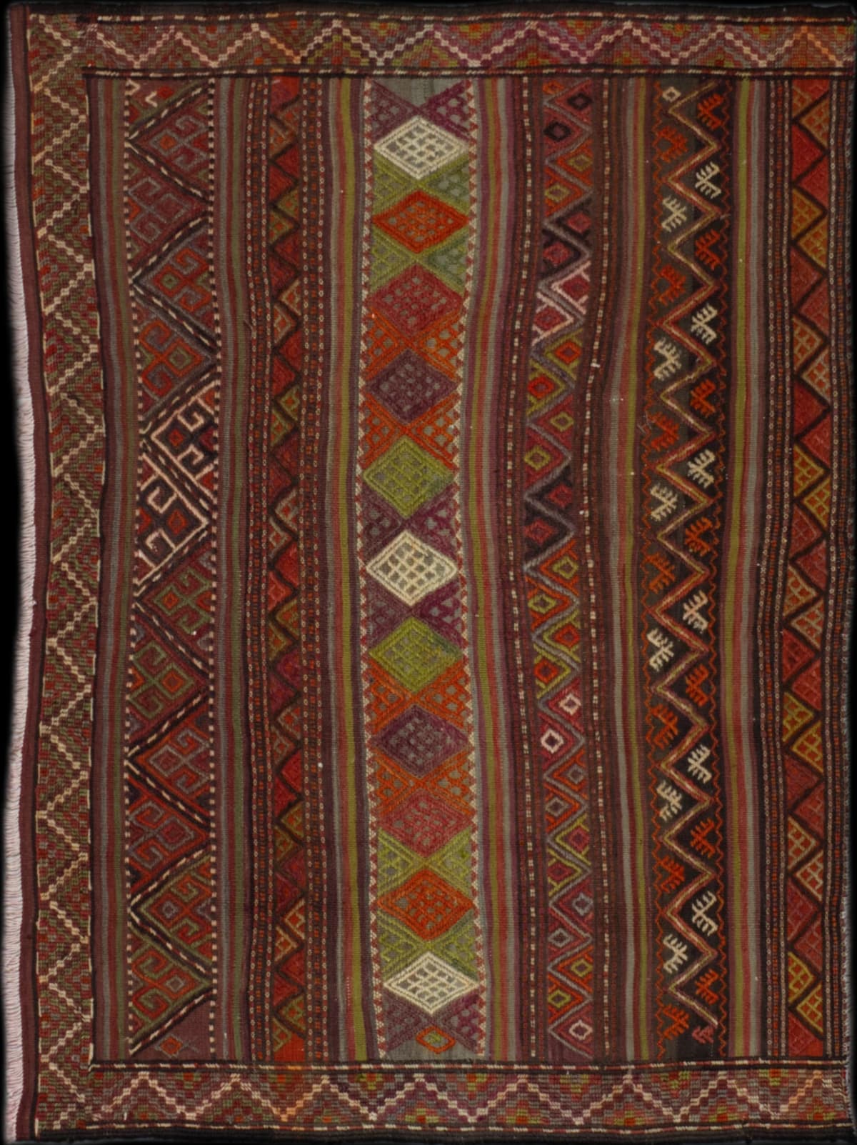 Persian rug in dimensions 161 centimeters length by 107 centimeters width with mainly brown and orange colors