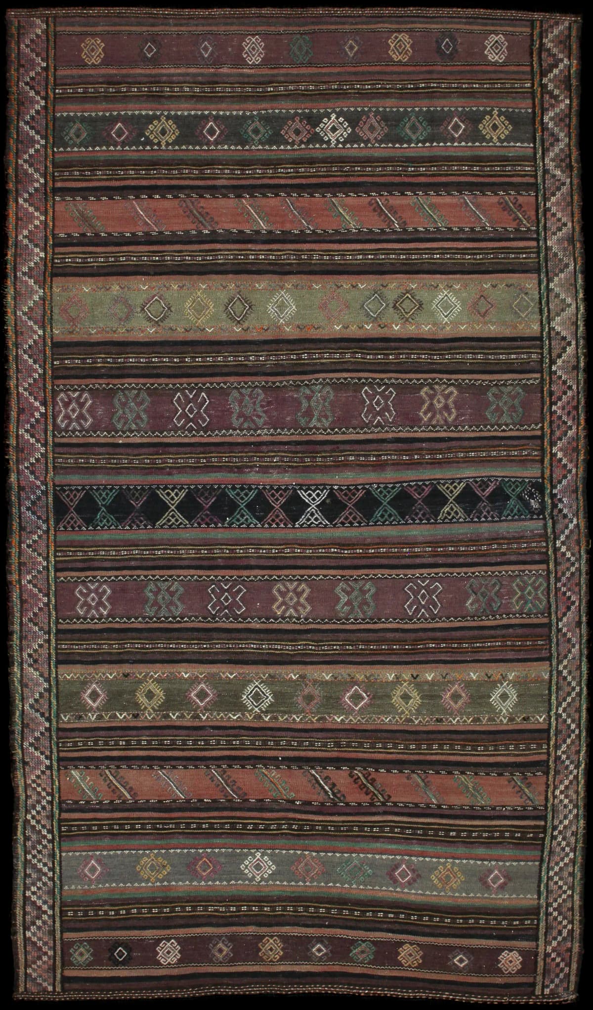 Persian rug of Sumak style in dimensions 254 centimeters length by 145 centimeters width