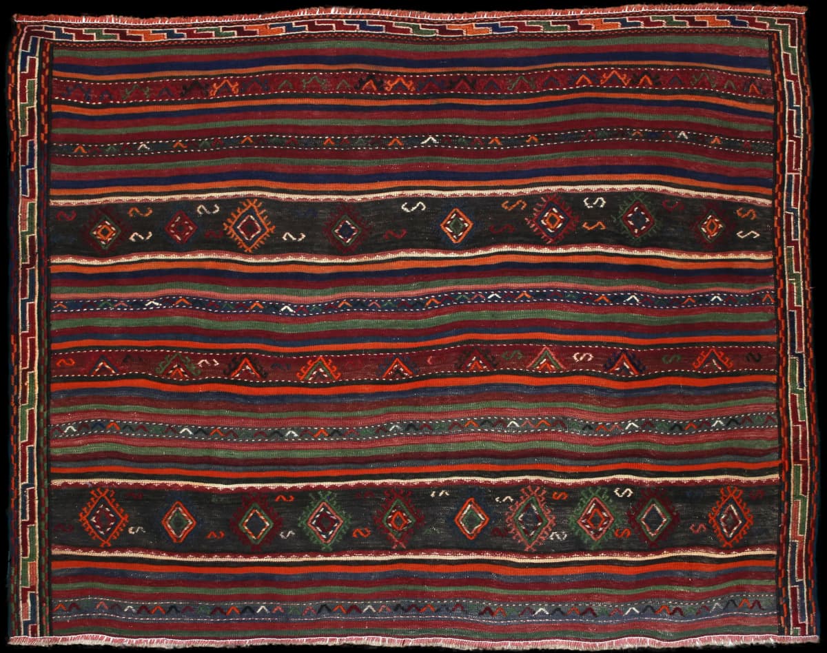 Persian rug of Sumak style in dimensions 196 centimeters length by 156 centimeters width