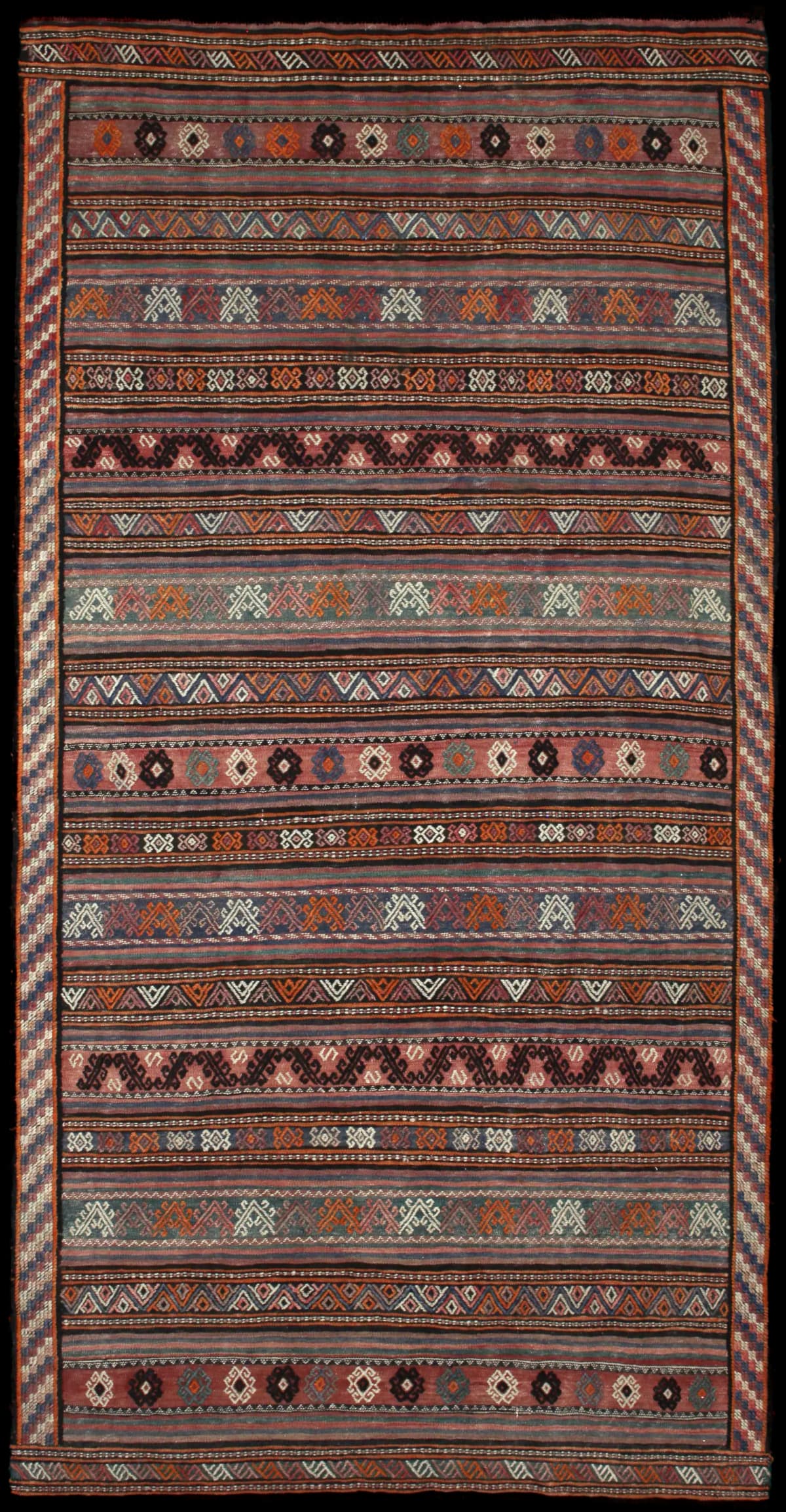 Persian rug of Sumak style in dimensions 273 centimeters length by 140 centimeters width