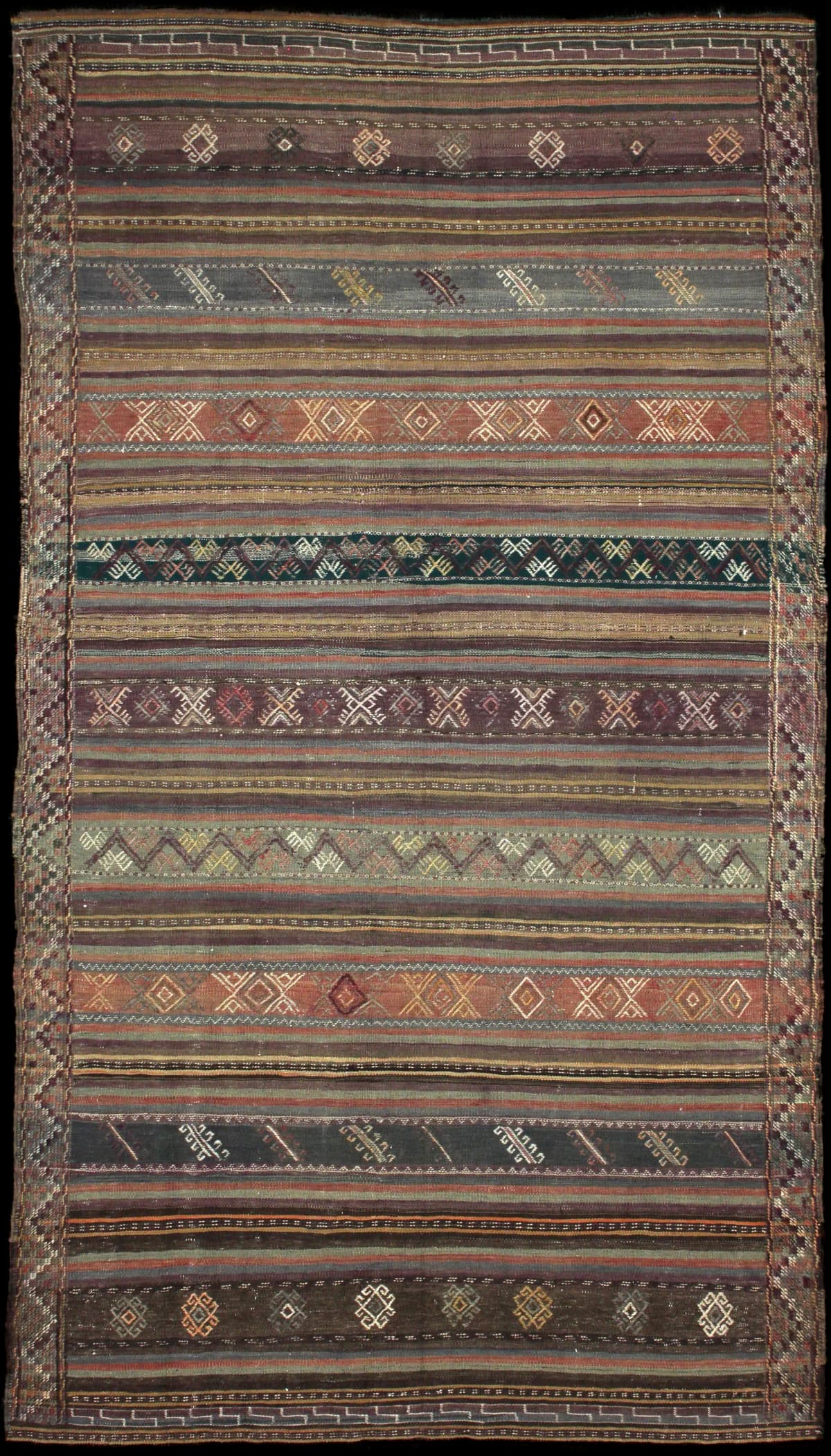 Persian rug of Sumak style in dimensions 250 centimeters length by 141 centimeters width with mainly brown colors