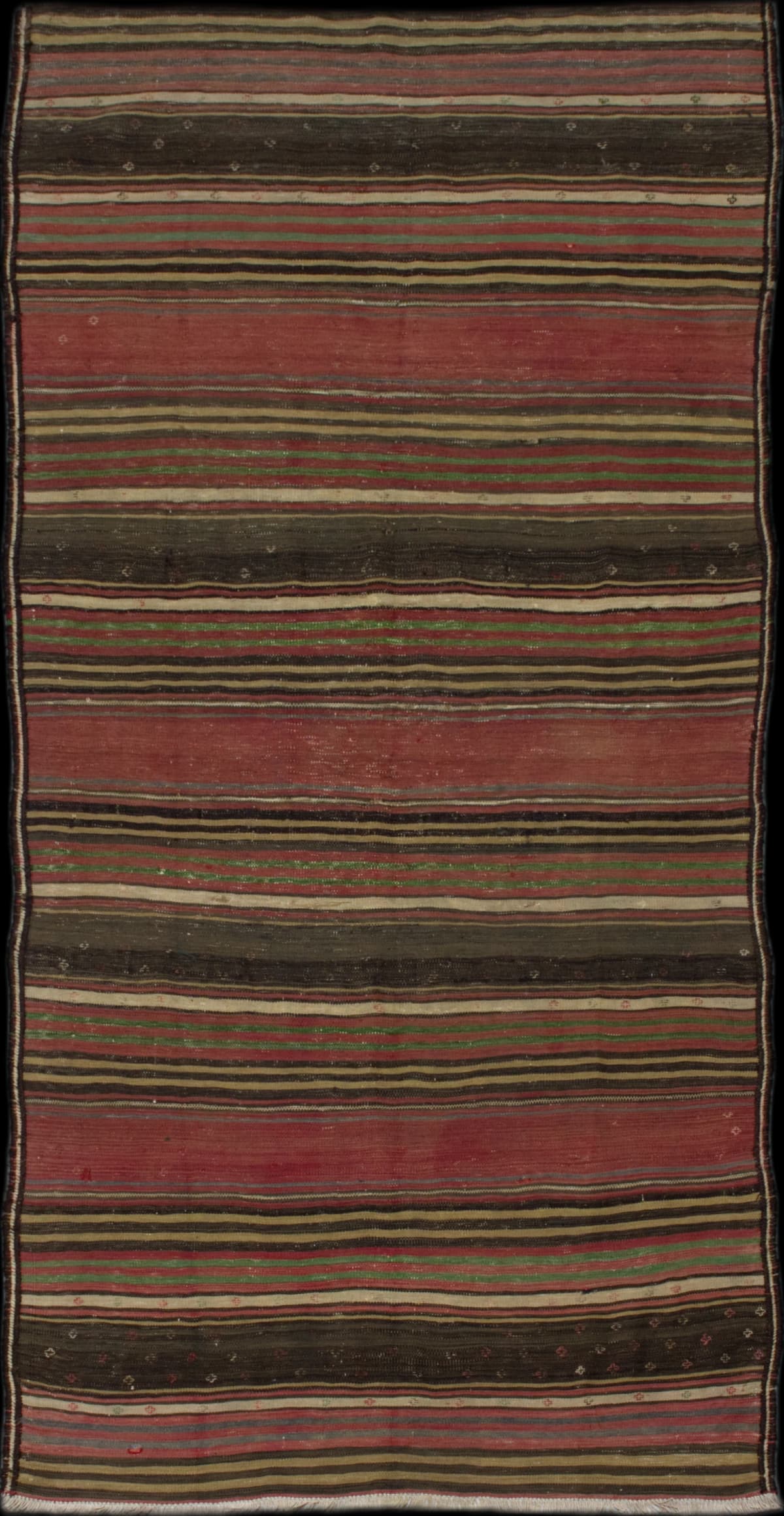 Persian rug in dimensions 251 centimeters length by 112 centimeters width with mainly brown colors