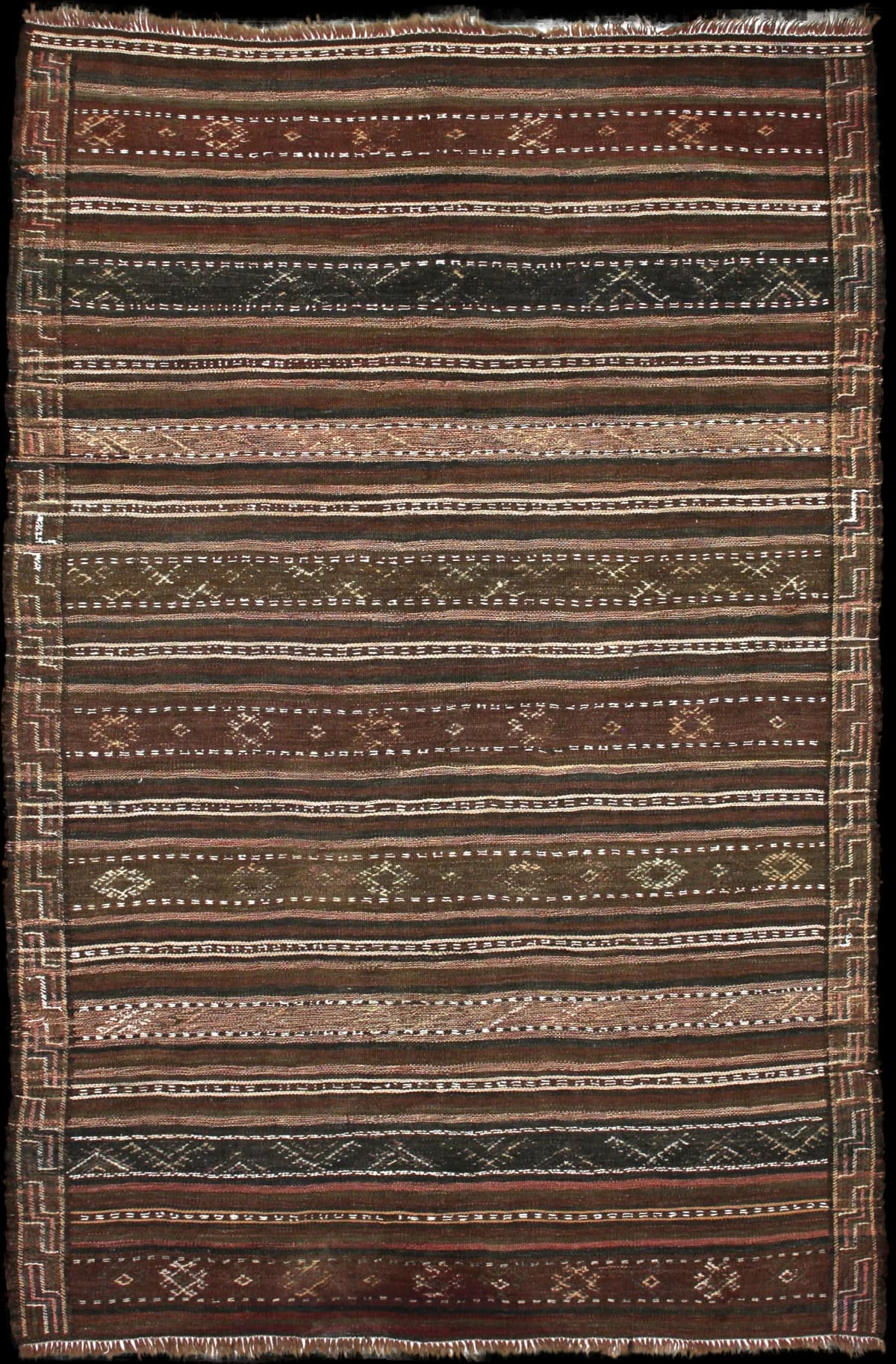 Persian rug of Sumak style in dimensions 211 centimeters length by 140 centimeters width with mainly brown colors