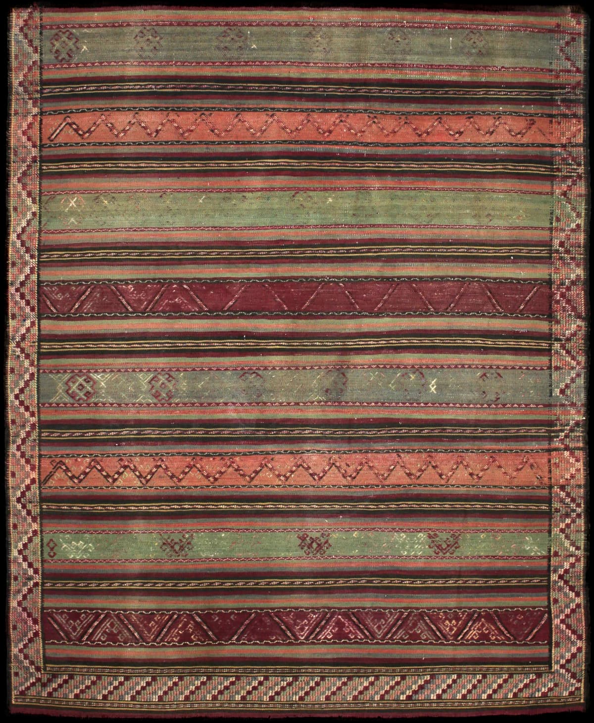 Persian rug of Sumak style in dimensions 200 centimeters length by 163 centimeters width with mainly green and purple colors