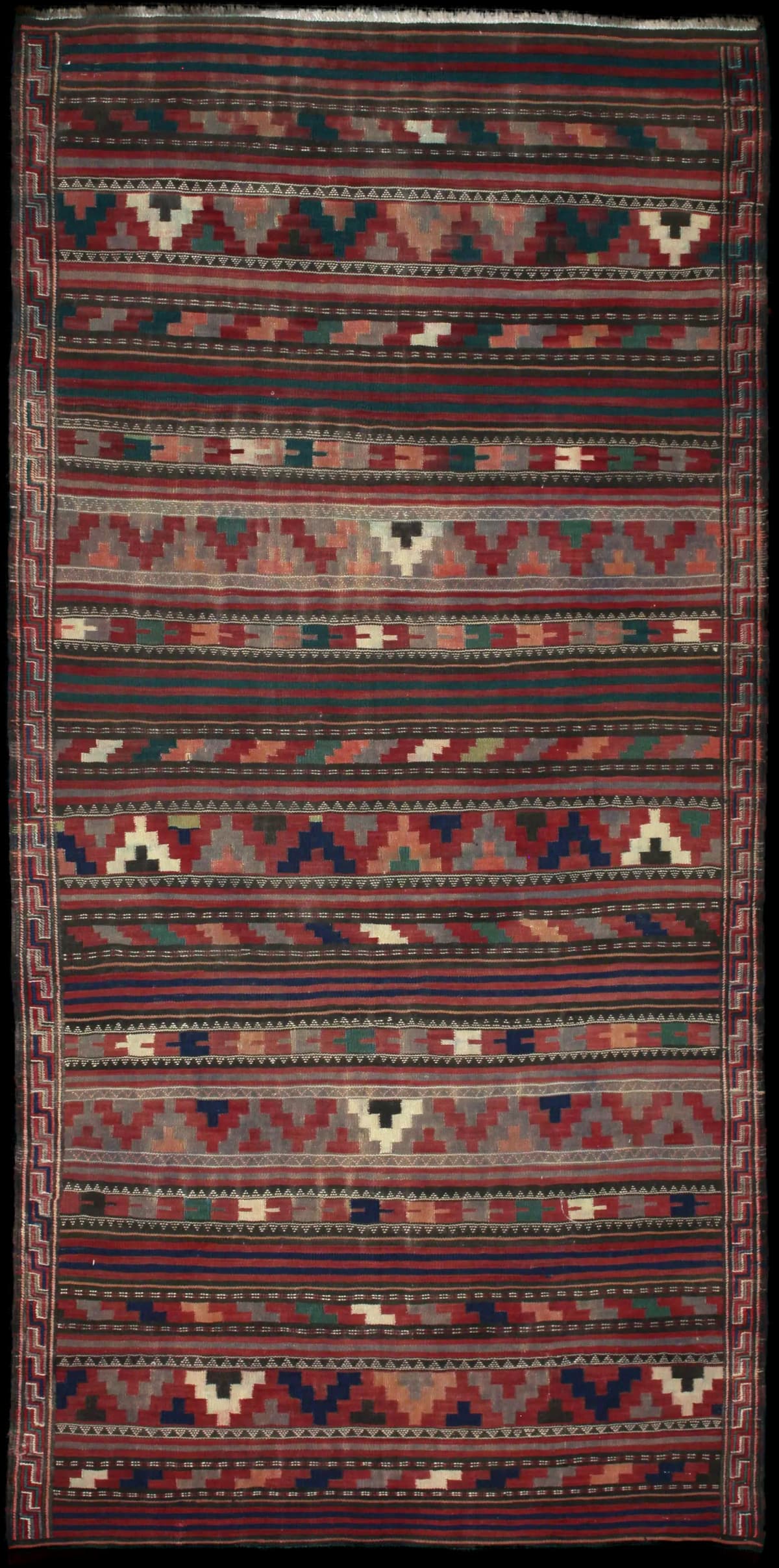 Persian rug of Sumak style in dimensions 268 centimeters length by 130 centimeters width