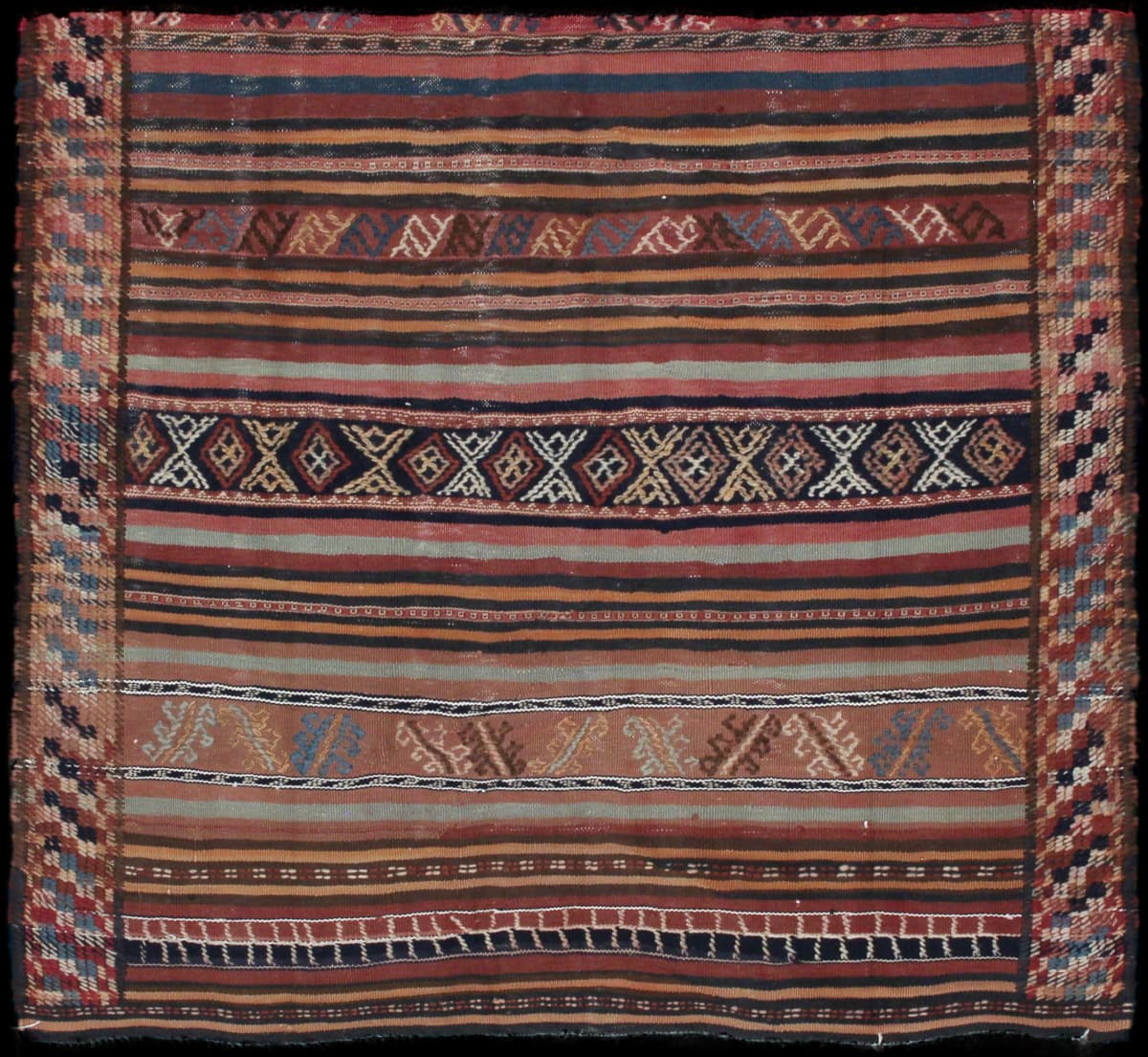 Persian rug of Sumak style in dimensions 128 centimeters length by 113 centimeters width