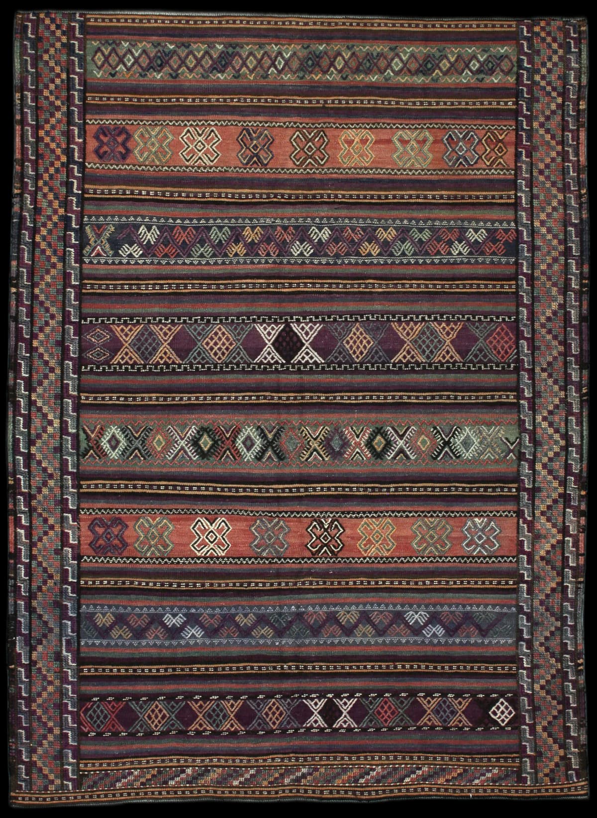 Persian rug of Sumak style in dimensions 205 centimeters length by 151 centimeters width with mainly purple and brown colors