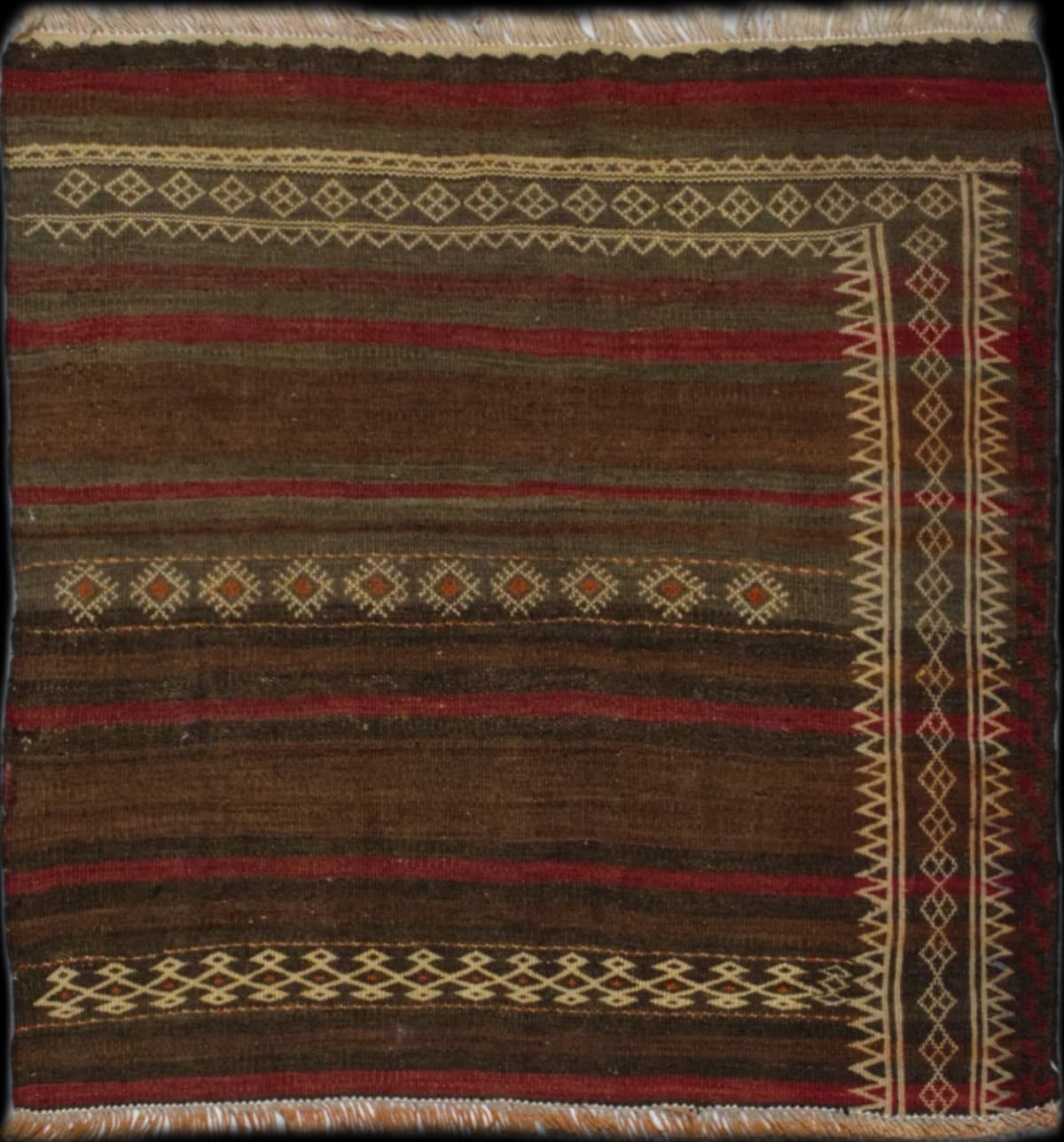 Persian rug in dimensions 83 centimeters length by 83 centimeters width with mainly red colors