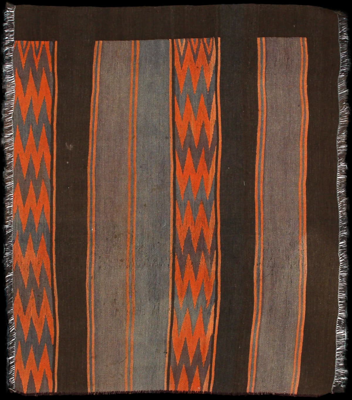 Persian rug of Kilim style in dimensions 137 centimeters length by 115 centimeters width with mainly orange and brown colors