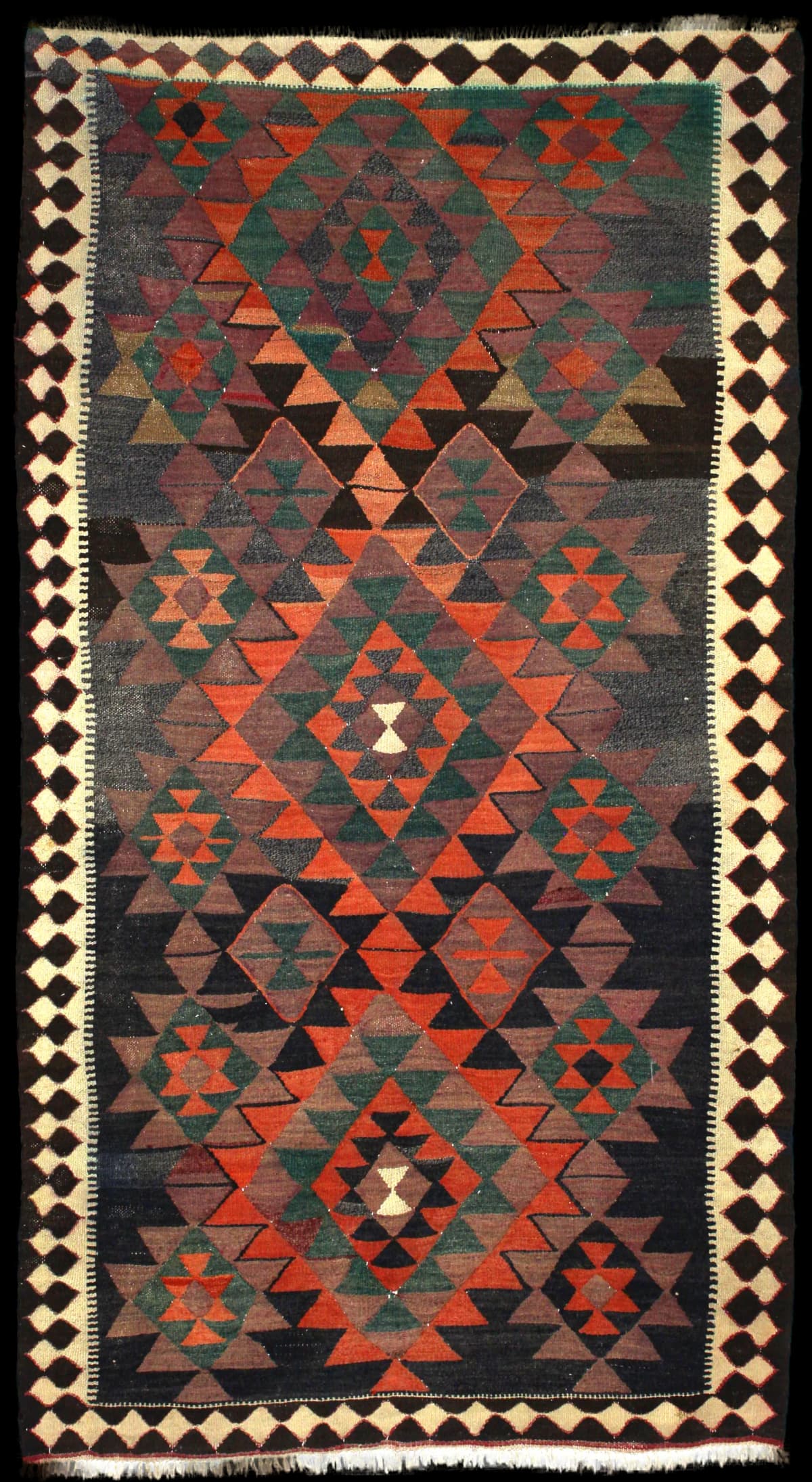 Persian rug of Kilim style in dimensions 250 centimeters length by 137 centimeters width with mainly orange colors