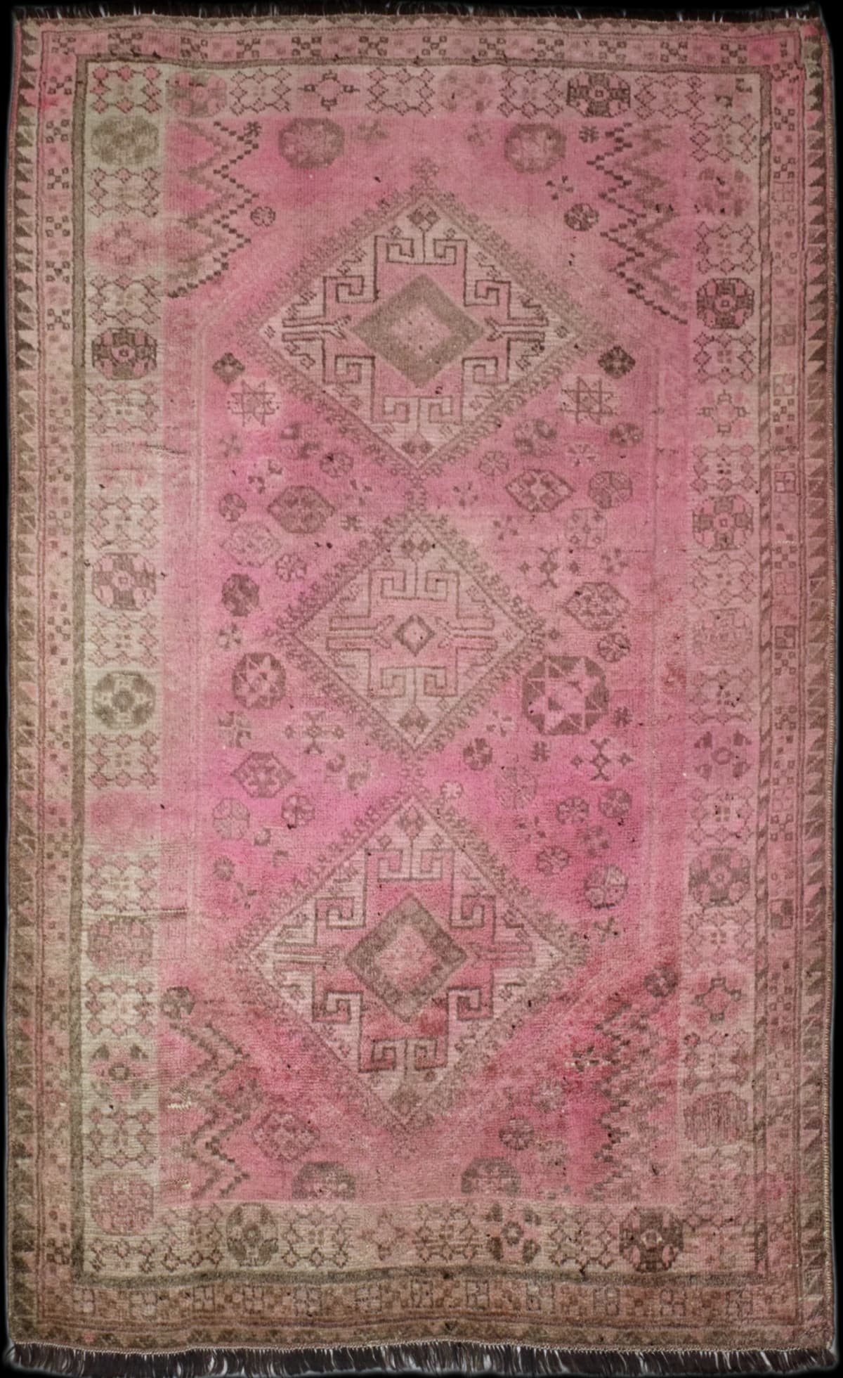 Persian rug in dimensions 245 centimeters length by 150 centimeters width with mainly pink colors