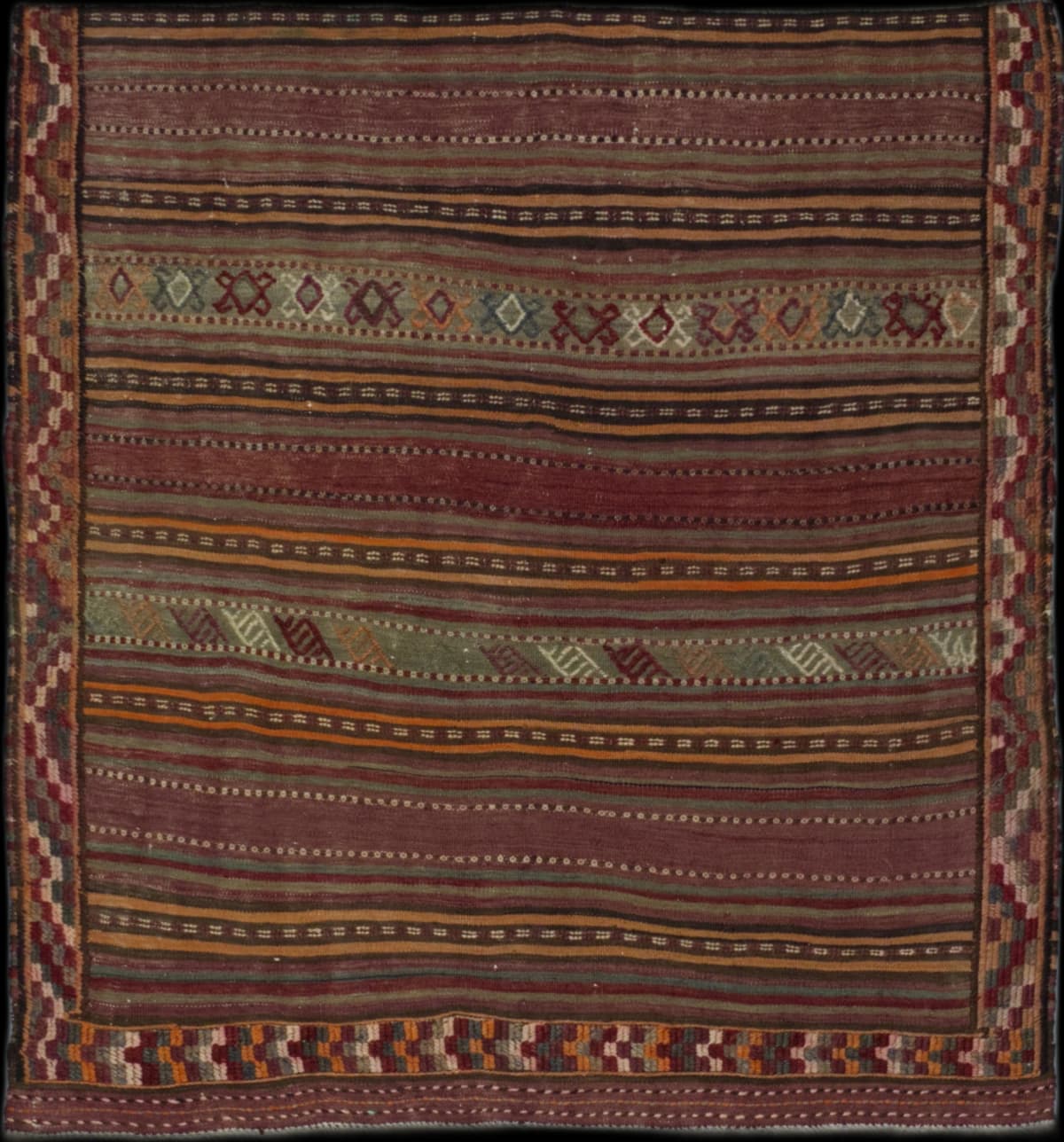 Persian rug in dimensions 140 centimeters length by 128 centimeters width with mainly brown colors