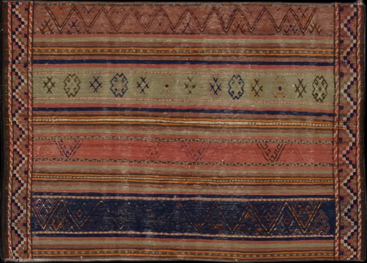 Persian rug in dimensions 162 centimeters length by 108 centimeters width with mainly colorful colors