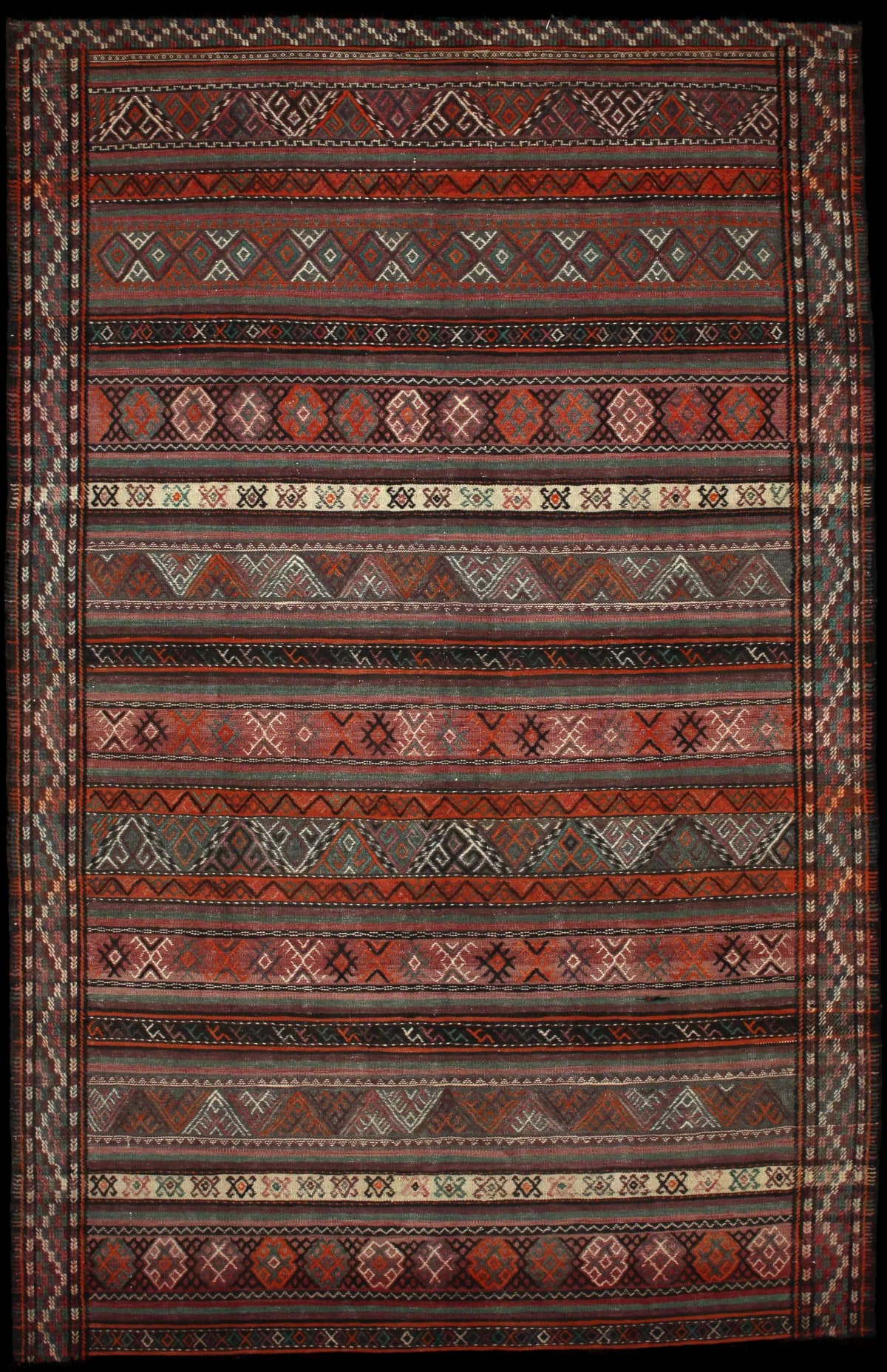 Persian rug of Sumak style in dimensions 247 centimeters length by 160 centimeters width with mainly red and brown colors