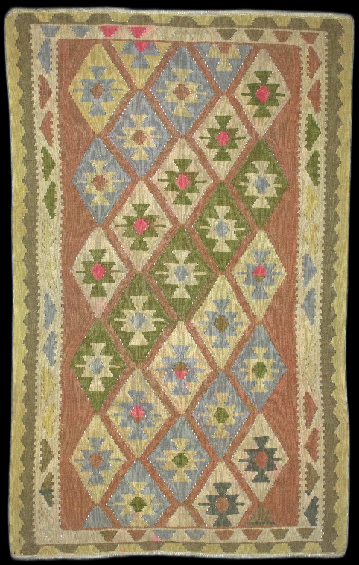Persian rug of Kilim style in dimensions 222 centimeters length by 136 centimeters width with mainly beige and green colors