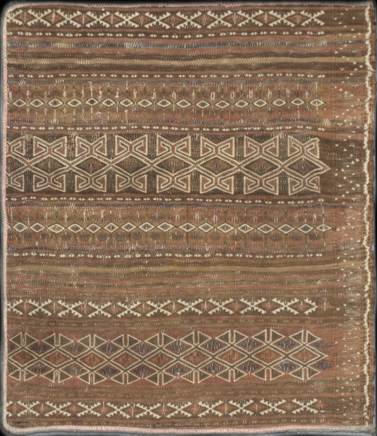 Persian rug in dimensions 65 centimeters length by 63 centimeters width