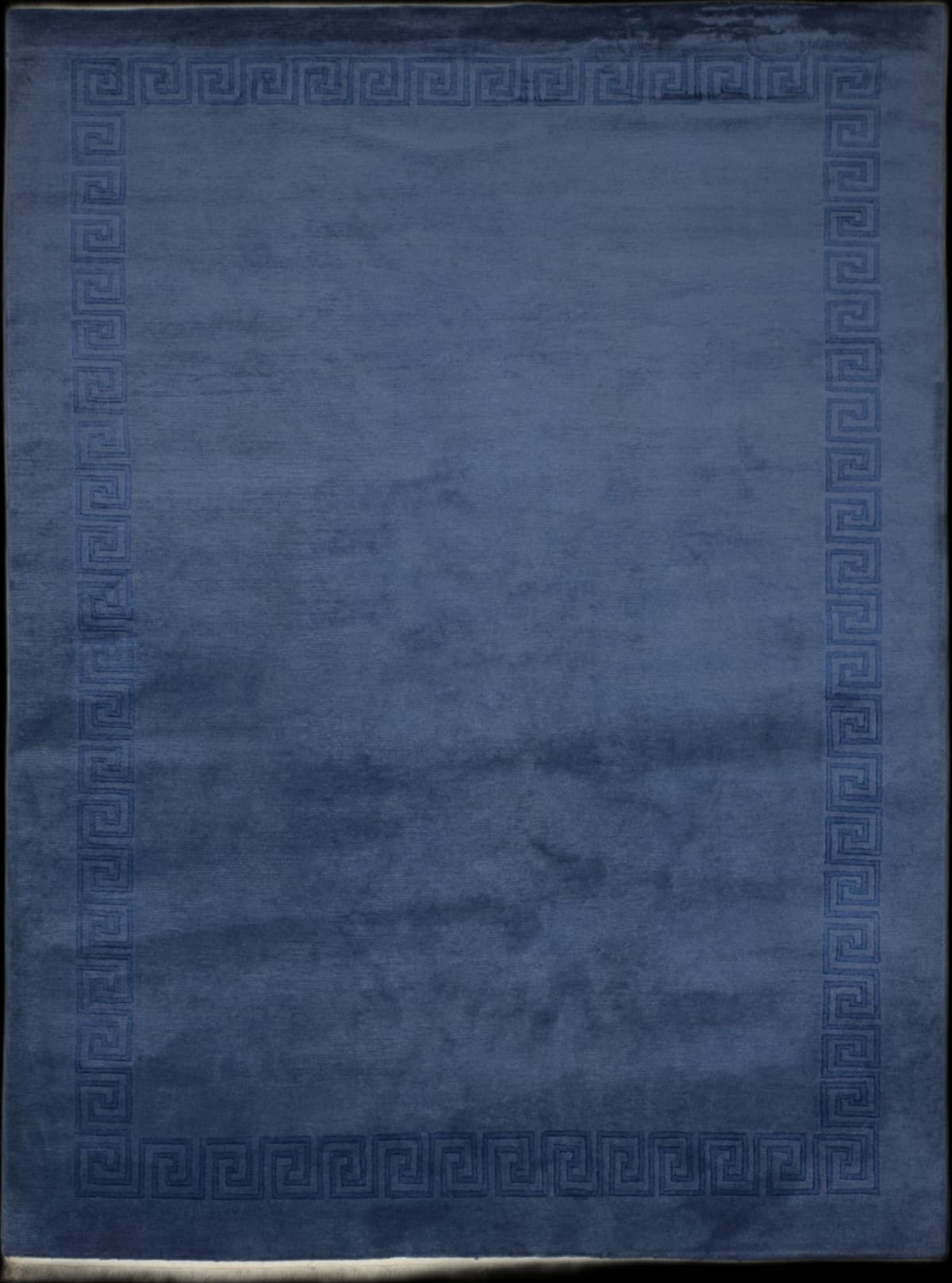 Nepali rug of Tibetan style in dimensions 298 centimeters length by 200 centimeters width with mainly blue colors
