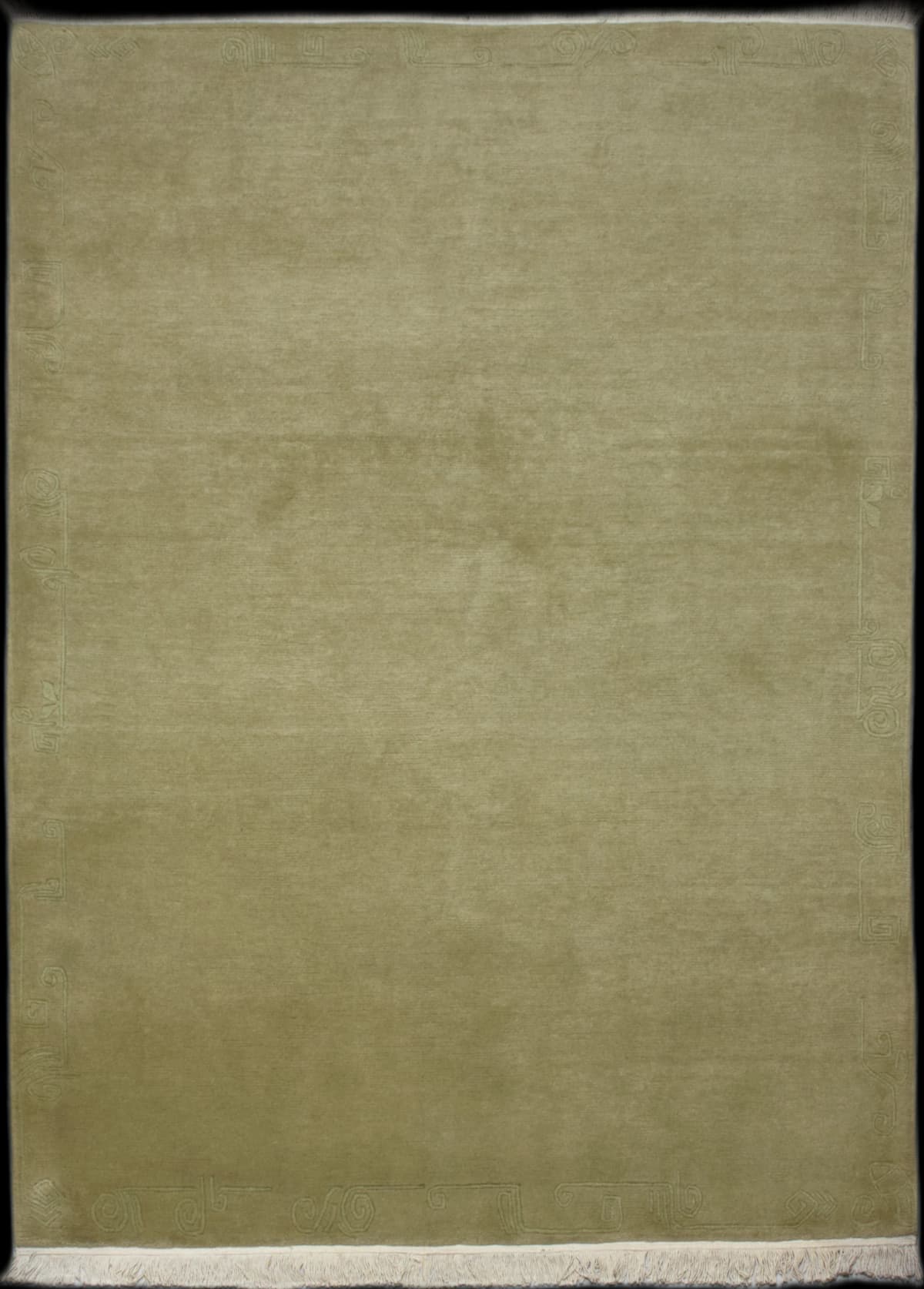 Nepali rug of Tibetan style in dimensions 240 centimeters length by 172 centimeters width with mainly green colors