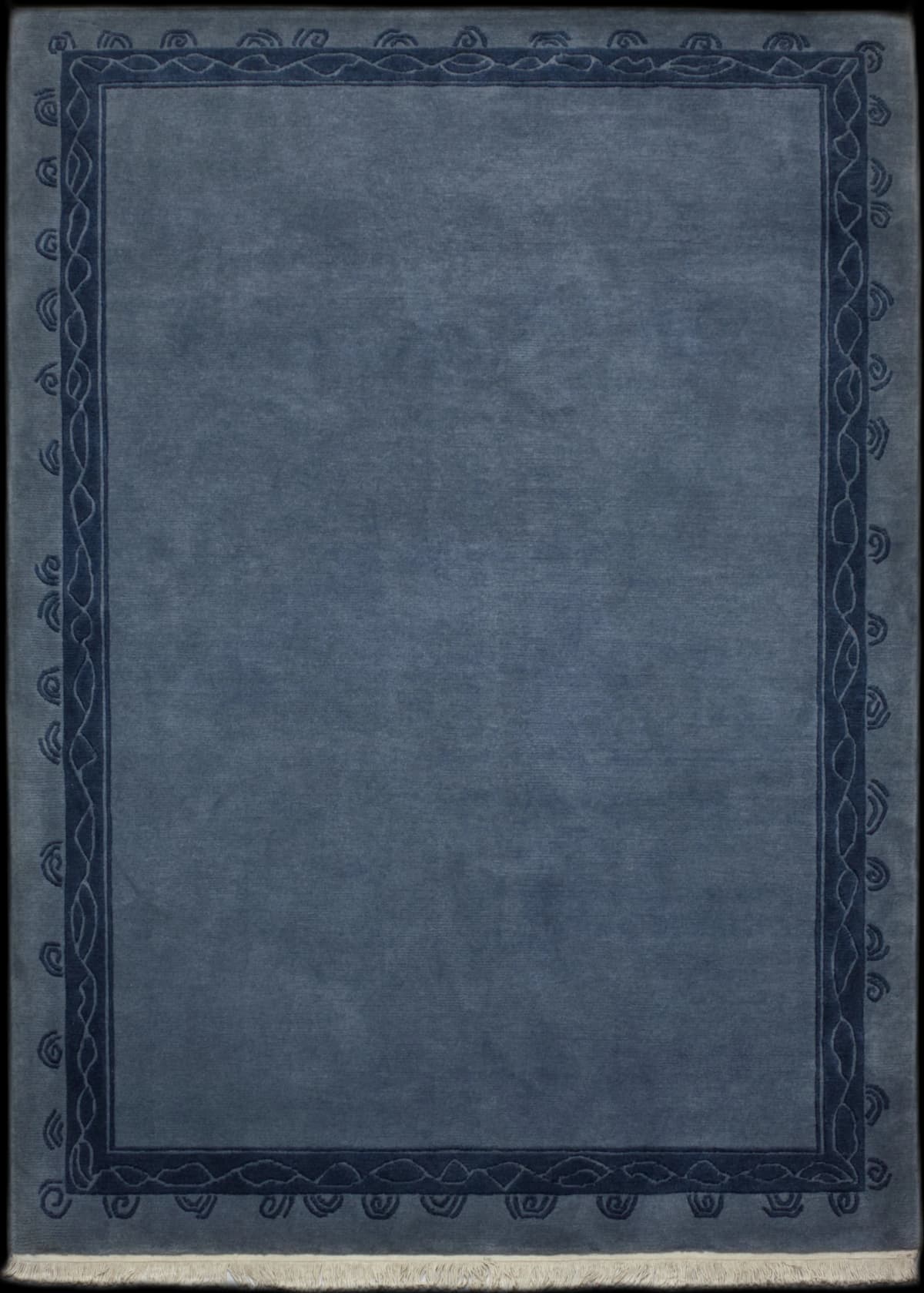 Nepalese rug of Tibetan style in dimensions 242 centimeters length by 173 centimeters width with mainly blue colors