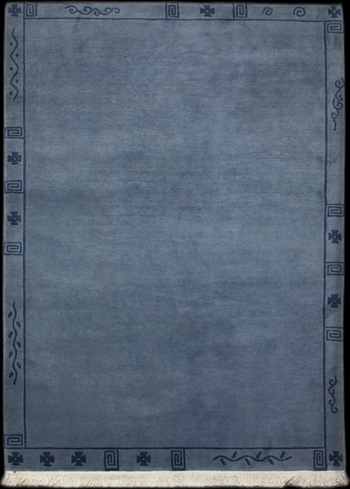 Nepali rug of Tibetan style in dimensions 240 centimeters length by 172 centimeters width with mainly green colors