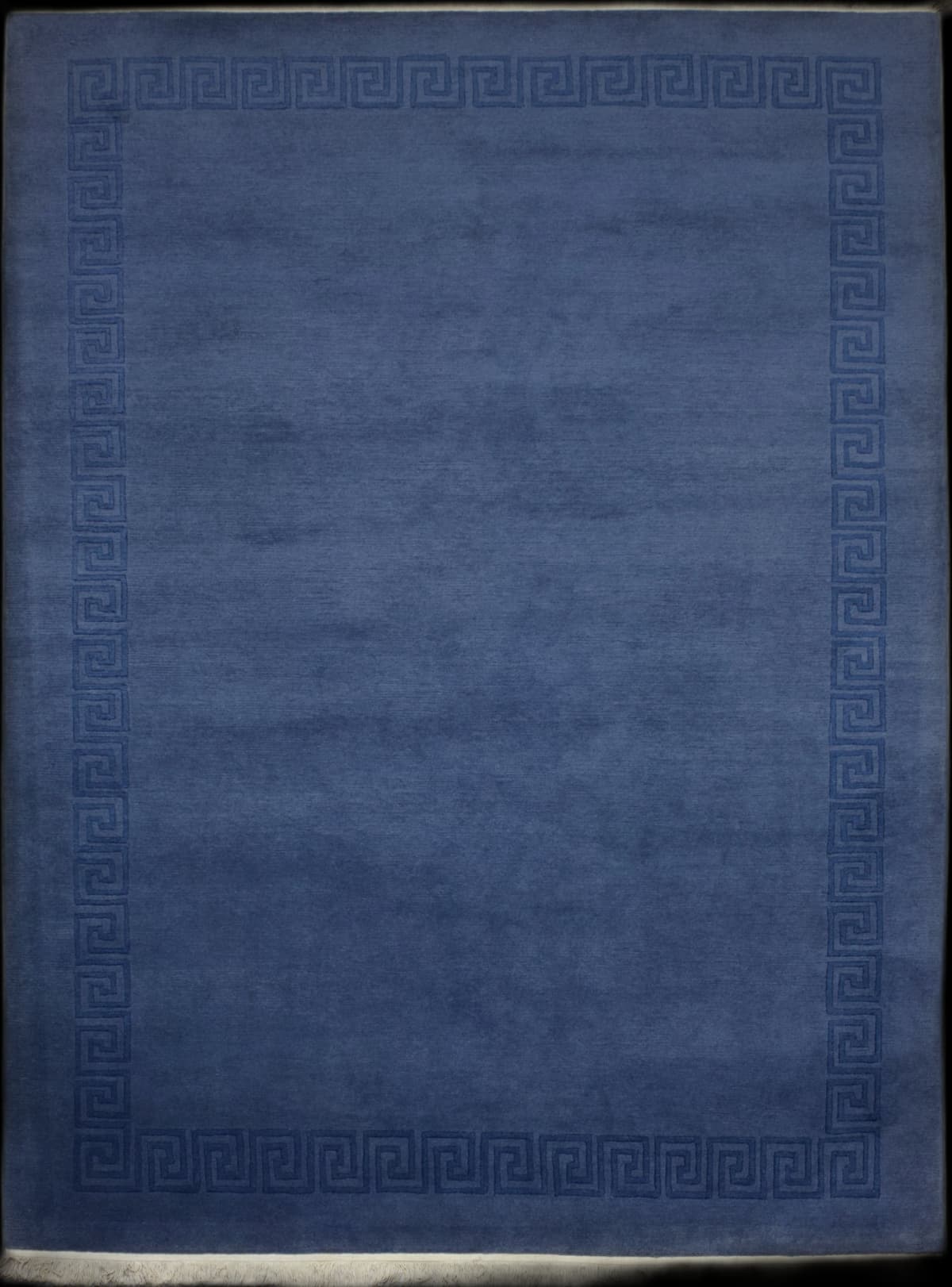Nepali rug of Tibetan style in dimensions 302 centimeters length by 203 centimeters width with mainly blue colors