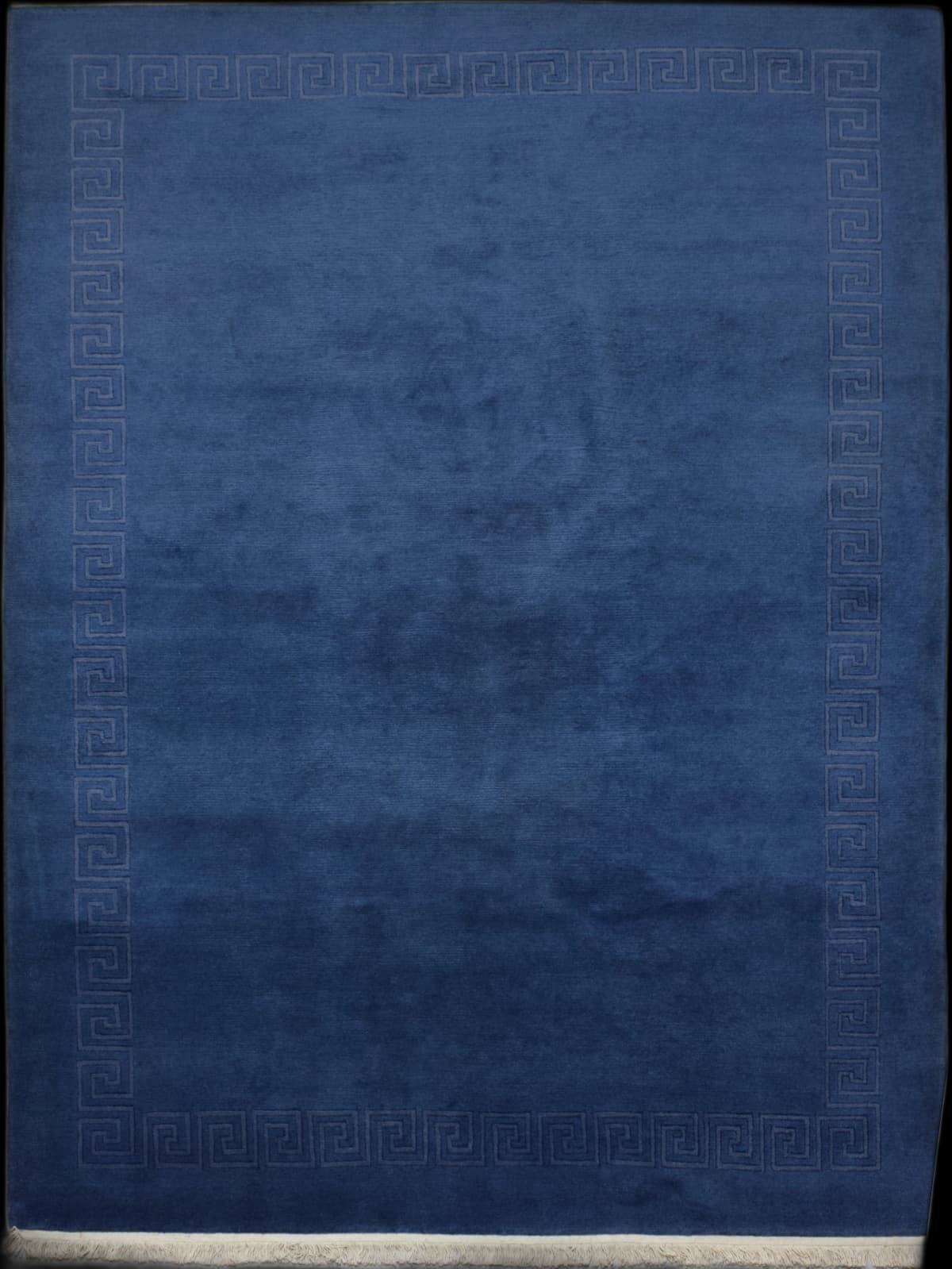 Nepali rug of Tibetan style in dimensions 295 centimeters length by 202 centimeters width with mainly blue colors