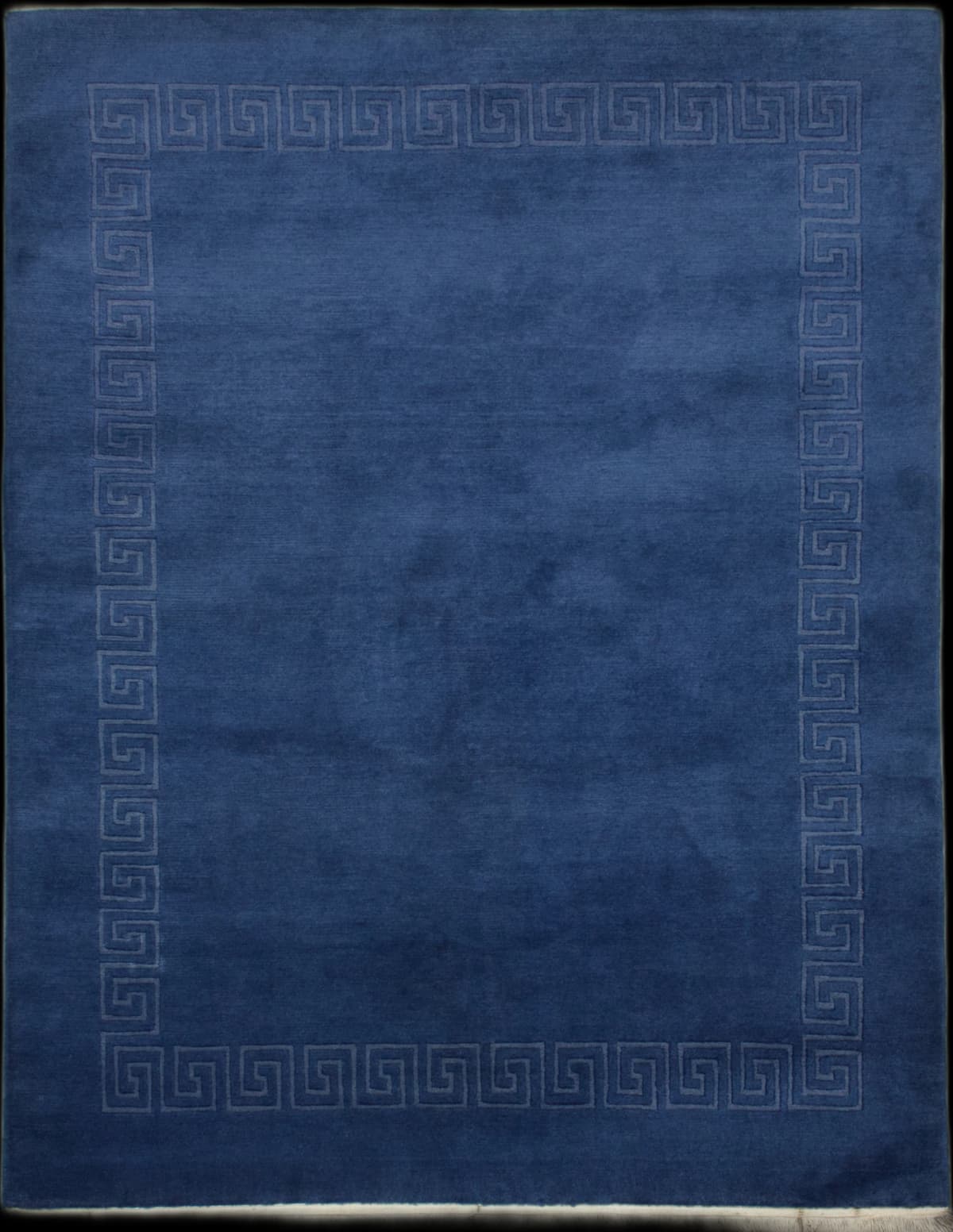 Nepali rug in dimensions 239 centimeters length by 171 centimeters width with mainly blue colors